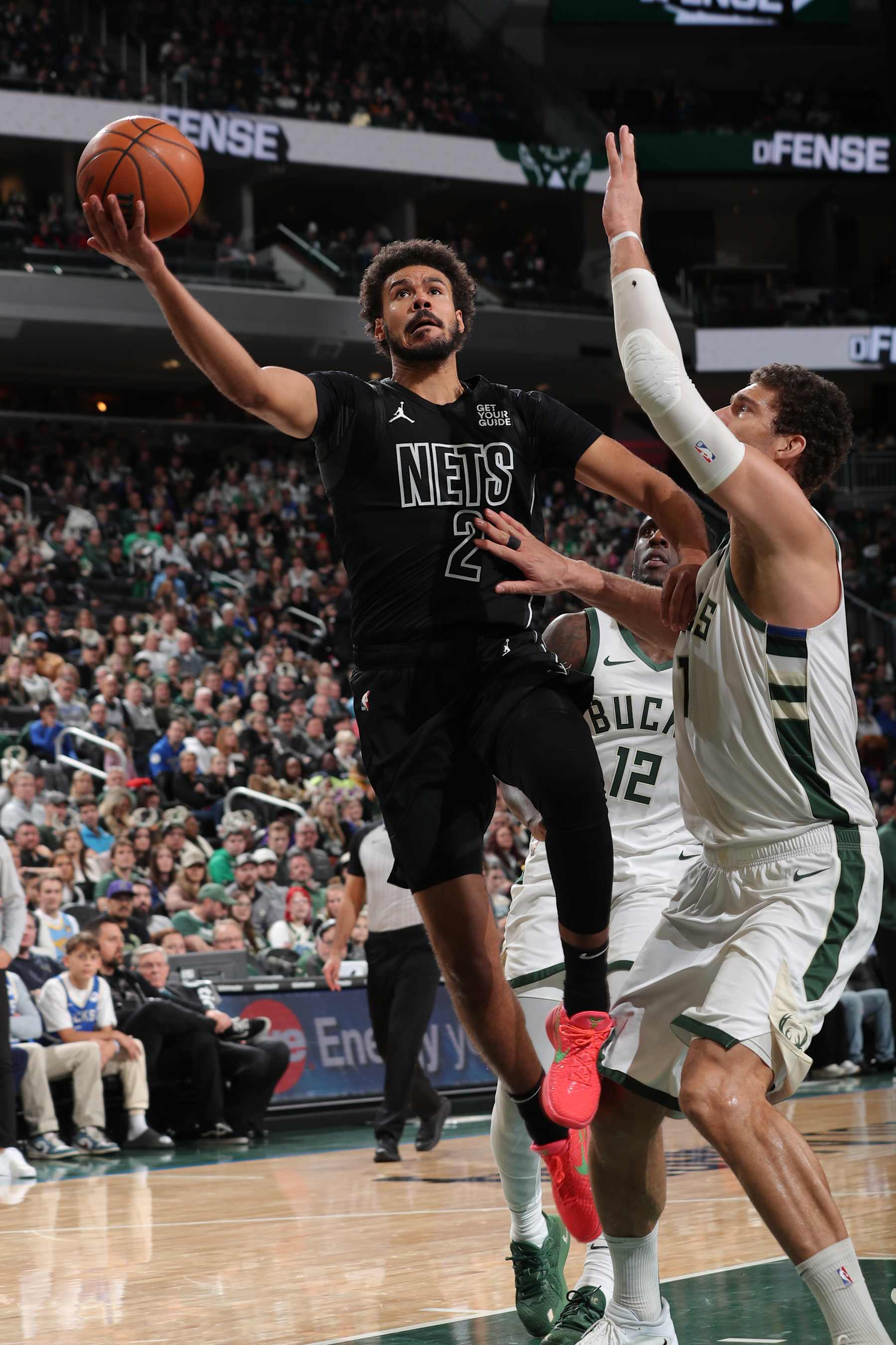 MILWAUKEE, WI - JANUARY 2: Cameron Johnson #2 of the Brooklyn Nets drives to the basket during the game against the Milwaukee Bucks on January 2, 2025 at Fiserv Forum Center in Milwaukee, Wisconsin. NOTE TO USER: User expressly acknowledges and agrees that, by downloading and or using this Photograph, user is consenting to the terms and conditions of the Getty Images License Agreement. Mandatory Copyright Notice: Copyright 2025 NBAE (Photo by Gary Dineen/NBAE via Getty Images).