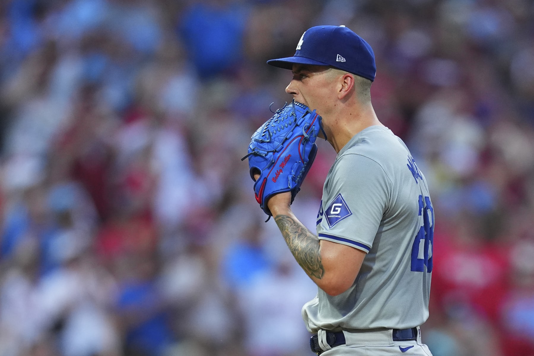 PHILADELPHIA, PENNSYLVANIA - JULY 9: Bobby Miller #28 of the Los Angeles Dodgers reacts after allowing a solo home run to Bryson Stott #5 of the Philadelphia Phillies in the bottom of the fourth inning at Citizens Bank Park on July 9, 2024 in Philadelphia, Pennsylvania. (Photo by Mitchell Leff/Getty Images)