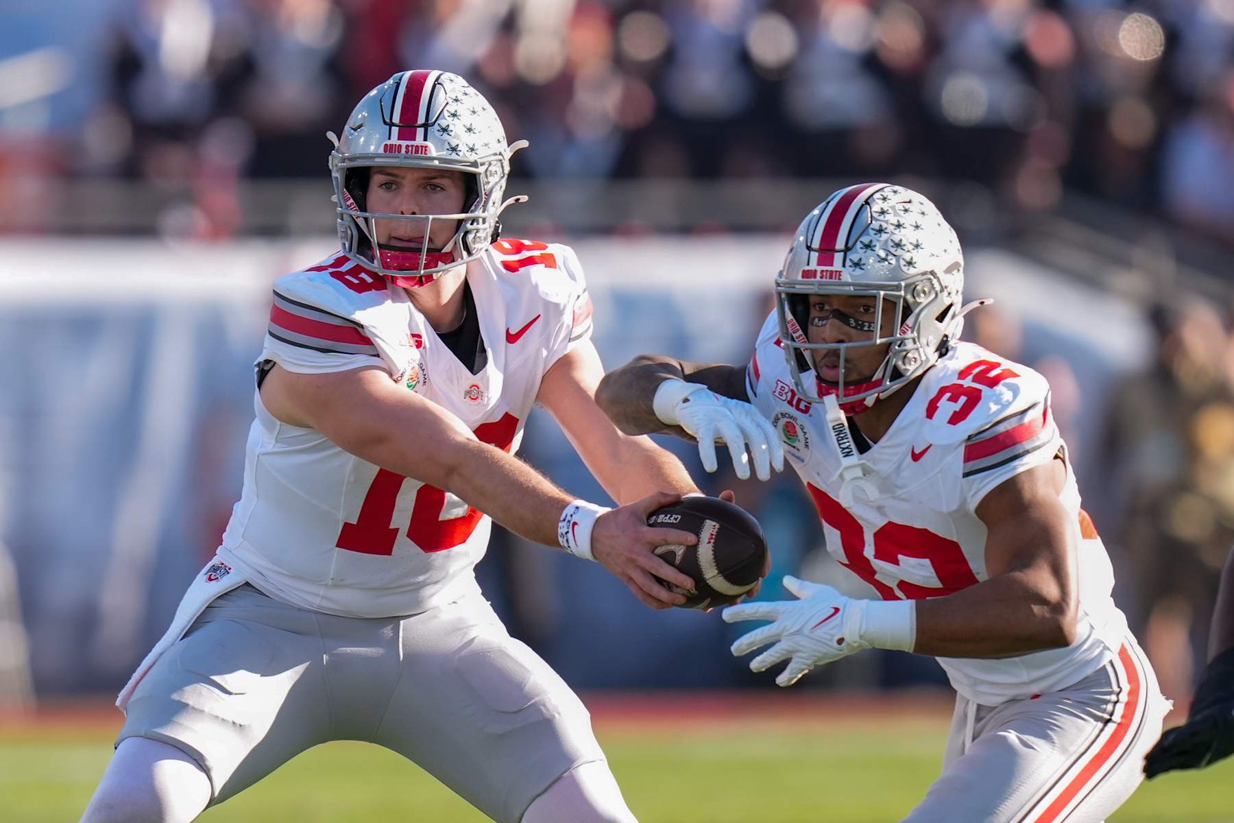 Ohio State quarterback Will Howard (left) and running back TreVeyon Henderson (right) are both considered NFL prospects. 