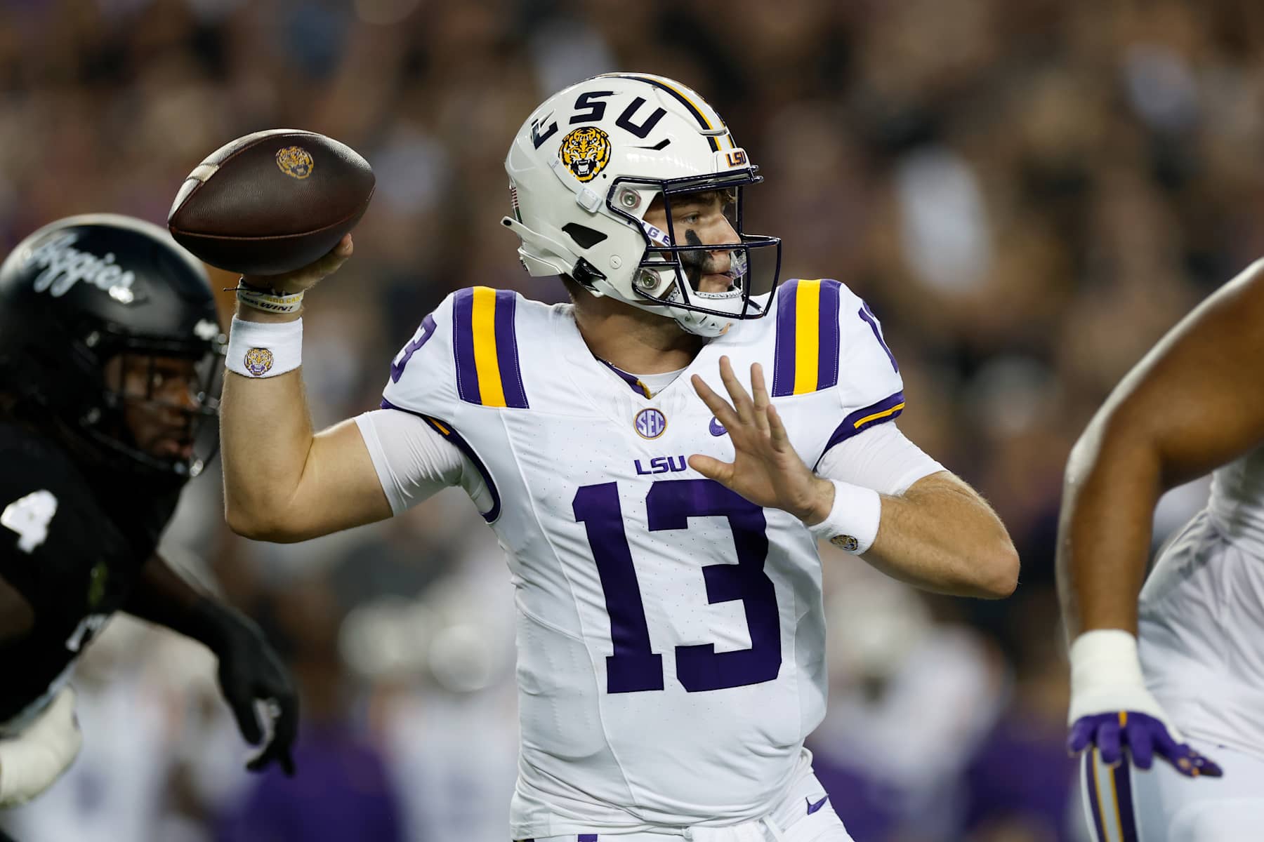 COLLEGE STATION, TEXAS - OCTOBER 26: Garrett Nussmeier #13 of the LSU Tigers throws a pass in the first half against the Texas A&M Aggies at Kyle Field on October 26, 2024 in College Station, Texas. (Photo by Tim Warner/Getty Images)