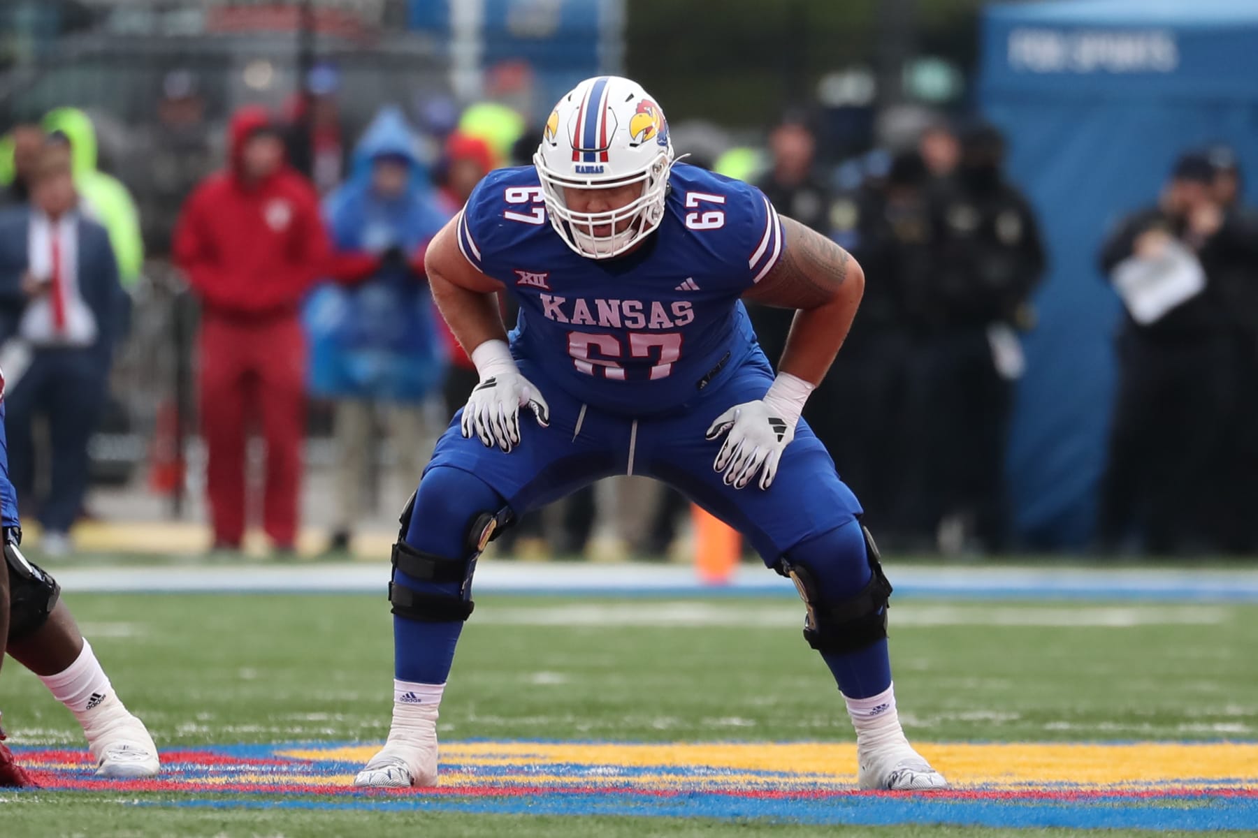 LAWRENCE, KS - OCTOBER 28: Kansas Jayhawks offensive lineman Dominick Puni (67) in the fourth quarter of a Big 12 football game between the Oklahoma Sooners and Kansas Jayhawks on Oct 28, 2023 at Memorial Stadium in Lawrence, KS.  (Photo by Scott Winters/Icon Sportswire via Getty Images)