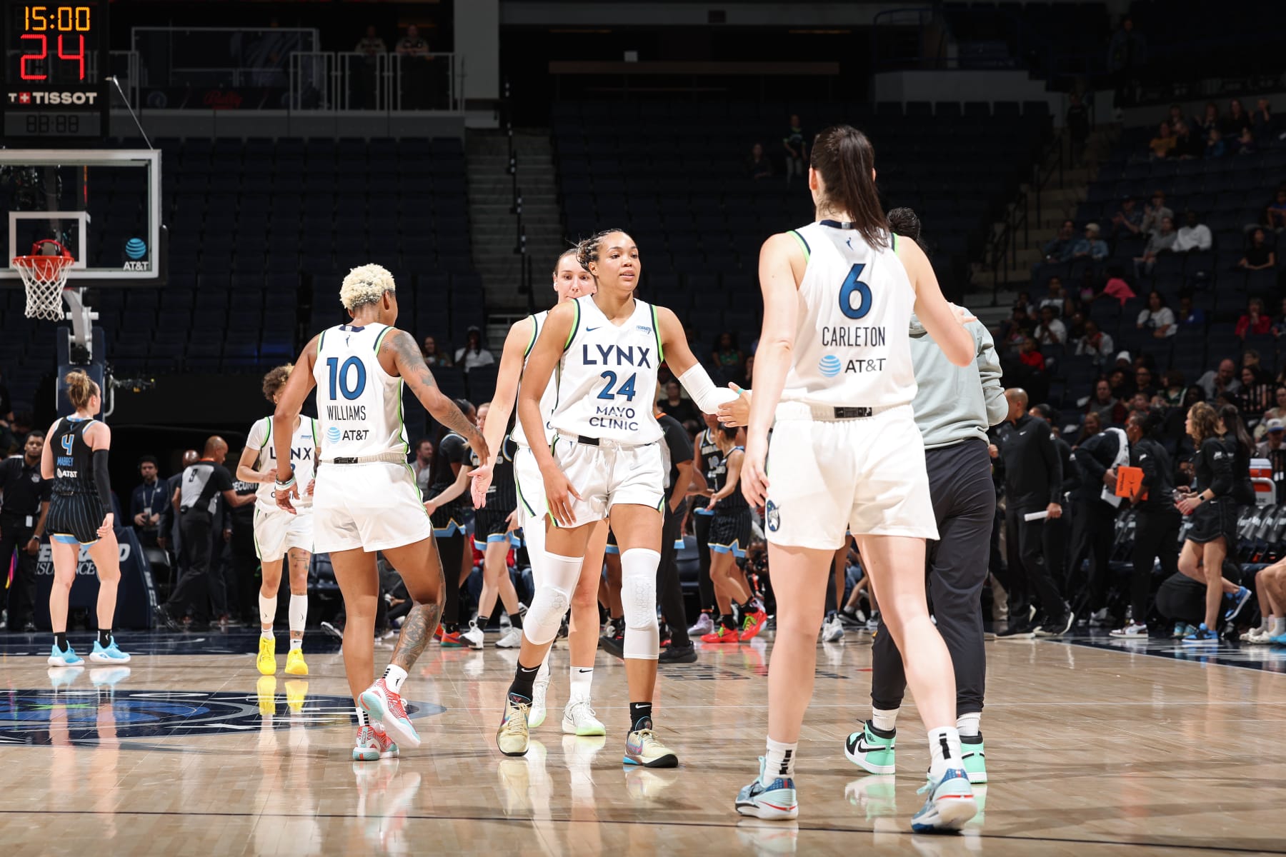 MINNEAPOLIS, MN -  MAY 3: Napheesa Collier #24 of the Minnesota Lynx high fives teammates during the game against the Chicago Sky during a WNBA preseason game on May 3, 2024 at Target Center in Minneapolis, Minnesota. NOTE TO USER: User expressly acknowledges and agrees that, by downloading and or using this Photograph, user is consenting to the terms and conditions of the Getty Images License Agreement. Mandatory Copyright Notice: Copyright 2024 NBAE (Photo by David Sherman/NBAE via Getty Images)