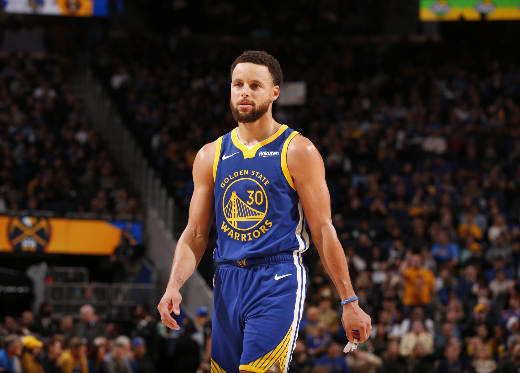 SAN FRANCISCO, CA - JANUARY 4: Stephen Curry #30 of the Golden State Warriors looks on during the game against the Denver Nuggets on January 4, 2024 at Chase Center in San Francisco, California. NOTE TO USER: User expressly acknowledges and agrees that, by downloading and or using this photograph, user is consenting to the terms and conditions of Getty Images License Agreement. Mandatory Copyright Notice: Copyright 2024 NBAE (Photo by Jed Jacobsohn/NBAE via Getty Images)