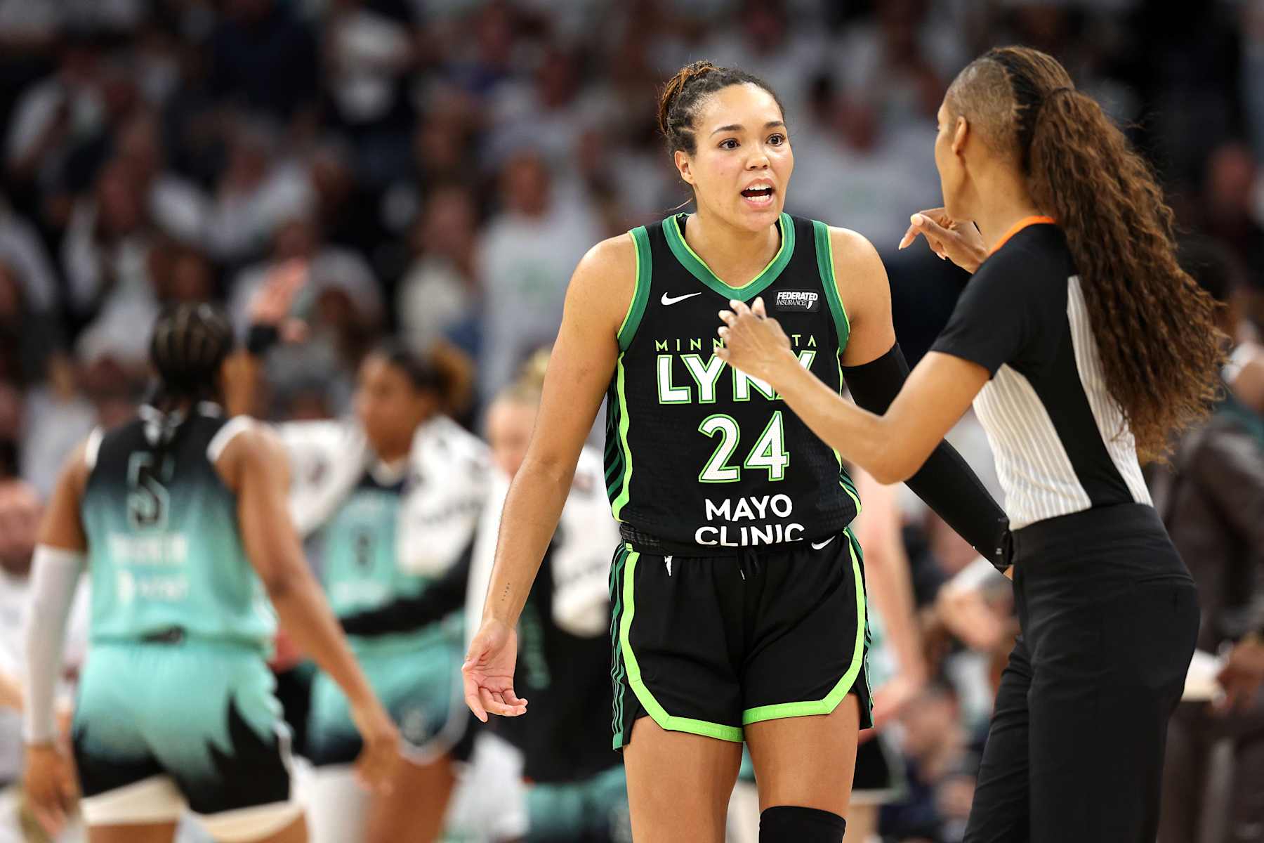 MINNEAPOLIS, MINNESOTA - OCTOBER 16: Napheesa Collier #24 of the Minnesota Lynx argues with a referee during the third quarter against the New York Liberty in Game Three of the WNBA Finals at Target Center on October 16, 2024 in Minneapolis, Minnesota. (Photo by David Berding/Getty Images)