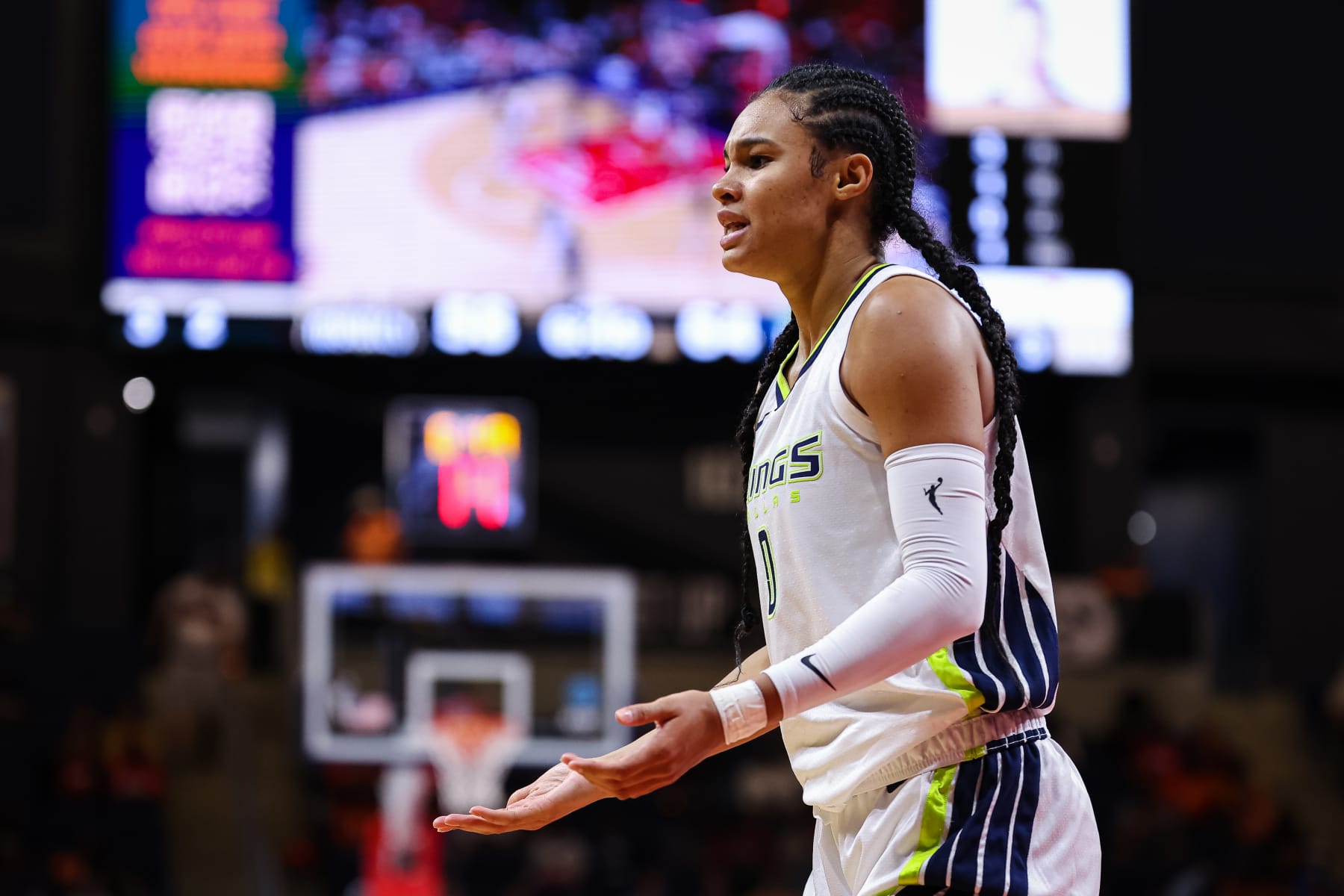 WASHINGTON, DC - JUNE 02: Satou Sabally #0 of the Dallas Wings reacts to a play against the Washington Mystics during the second half of the game at Entertainment & Sports Arena on June 2, 2023 in Washington, DC. NOTE TO USER: User expressly acknowledges and agrees that, by downloading and or using this photograph, User is consenting to the terms and conditions of the Getty Images License Agreement. (Photo by Scott Taetsch/Getty Images)