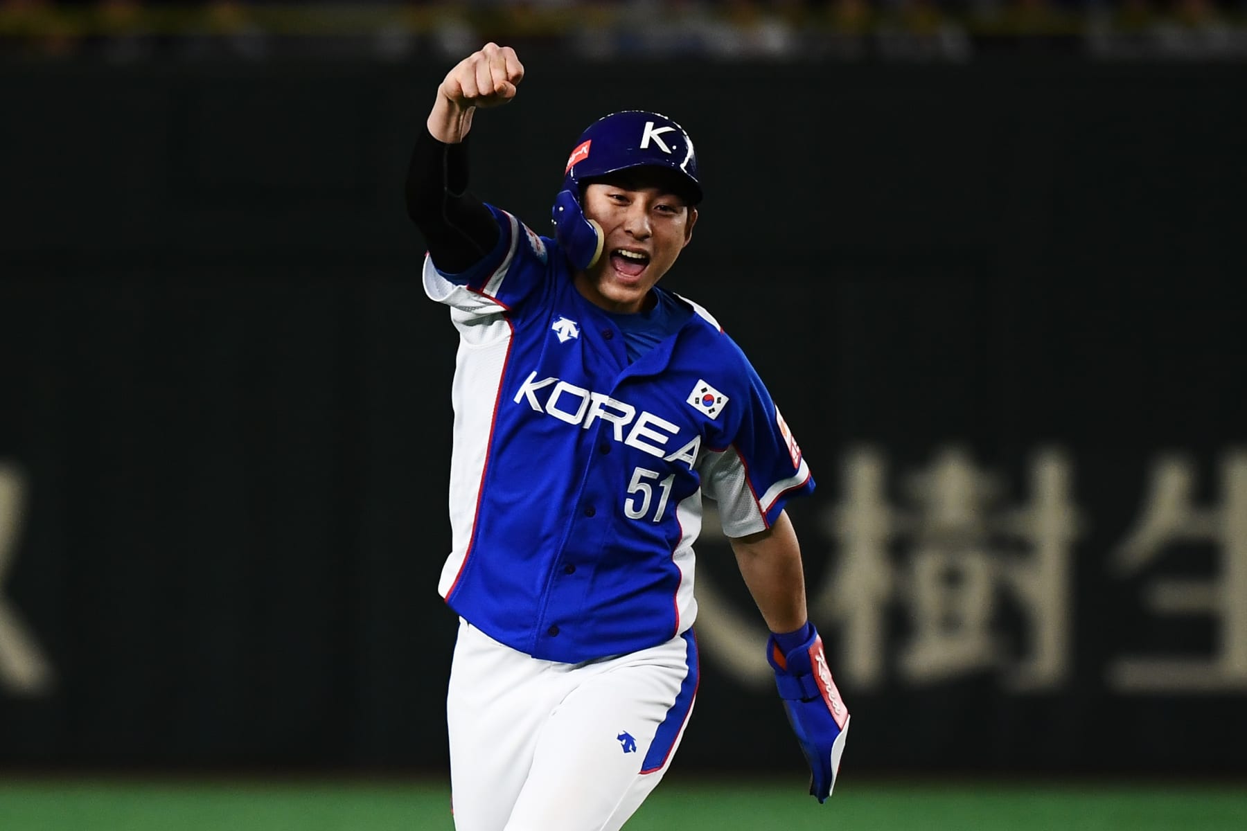 Jung-Hoo Lee of South Korea celebrates a home run of Ha Seong Kim during the WBSC Premier 12 Super Round Final baseball game between South Korea and Japan, at the Tokyo Dome in Tokyo on November 17, 2019. (Photo by CHARLY TRIBALLEAU / AFP) (Photo by CHARLY TRIBALLEAU/AFP via Getty Images)