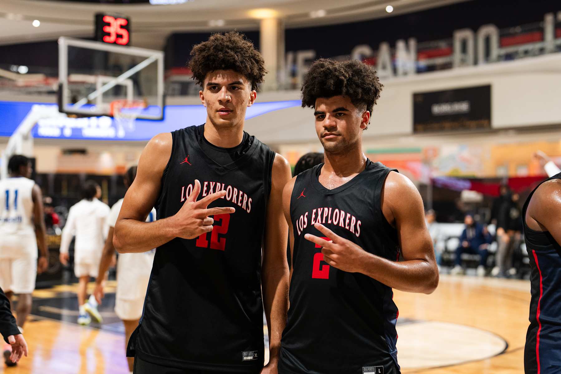 EAST RUTHERFORD, NJ - MARCH 27: Cayden Boozer #2 and Cameron Boozer #12 of the Columbus Explorers pose for picture after the game against the Notre Dame Knights during The Throne high school basketball tournament on March 27, 2024 at American Dream in East Rutherford, New Jersey. NOTE TO USER: User expressly acknowledges and agrees that, by downloading and/or using this photograph, user is consenting to the terms and conditions of the Getty Images License Agreement. Mandatory Copyright Notice: Copyright 2024 NBAE (Photo by Evan Yu/NBAE via Getty Images)