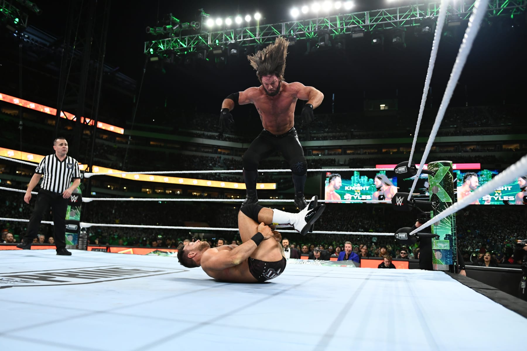 PHILADELPHIA, PENNSYLVANIA - APRIL 07: AJ Styles (R) in action against LA Knight during Night Two of WrestleMania 40 at Lincoln Financial Field on April 7, 2024 in Philadelphia, Pennsylvania. (Photo by WWE/Getty Images)