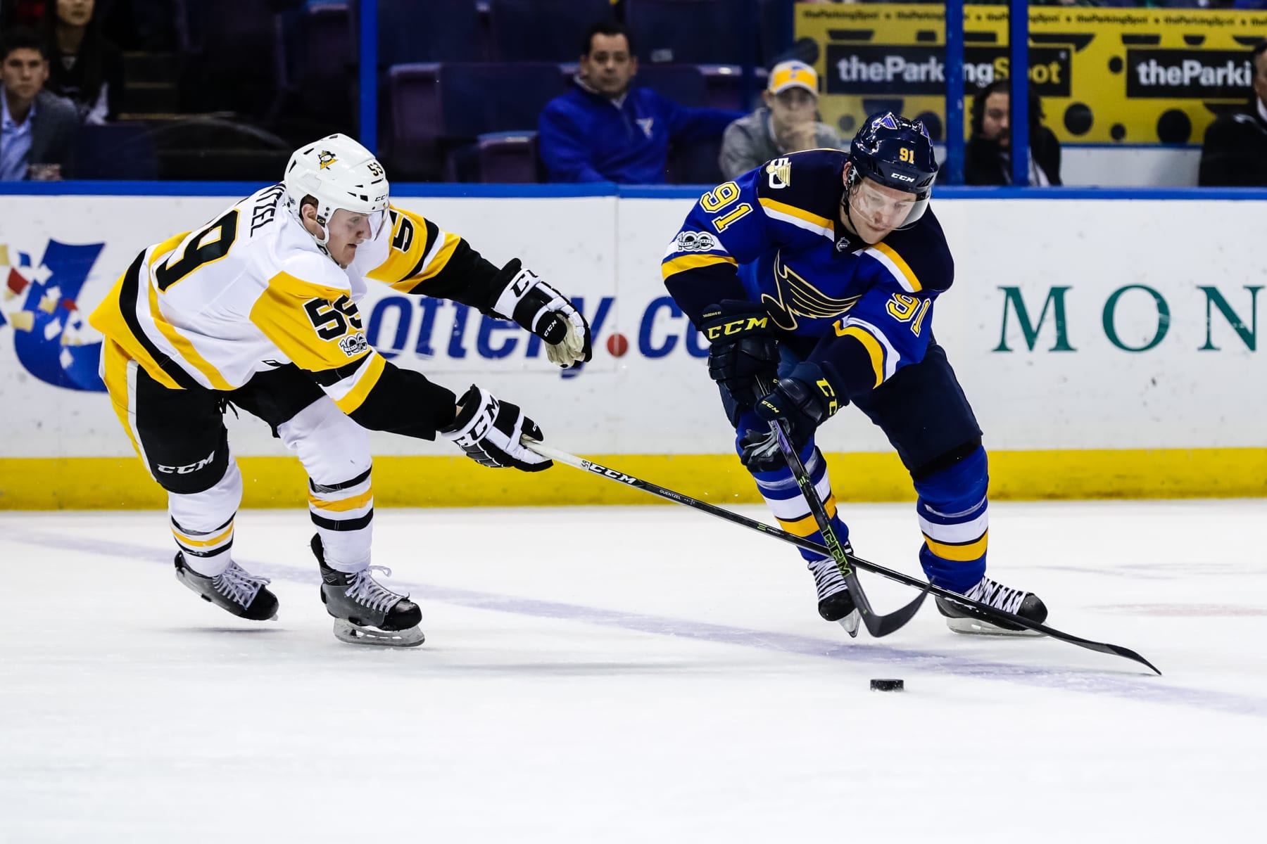 ST. LOUIS, MO - FEBRUARY 04:  St. Louis Blues Right Wing Vladimir Tarasenko (91) fights for control of the puck with Pittsburgh Penguins Left Wing Jake Guentzel (59) during the third period of an NHL hockey game between the Pittsburgh Penguins and the St. Louis Blues.  The Penguins defeated the Blues 4-1 on February 4, 2017, at Scottrade Center in St. Louis, MO.  (Photo by Tim Spyers/Icon Sportswire via Getty Images)
