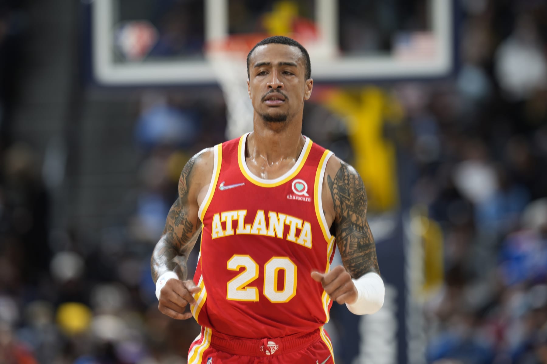 Atlanta Hawks forward John Collins (20) in the first half of an NBA basketball game Friday, Nov. 12, 2021, in Denver. (AP Photo/David Zalubowski)