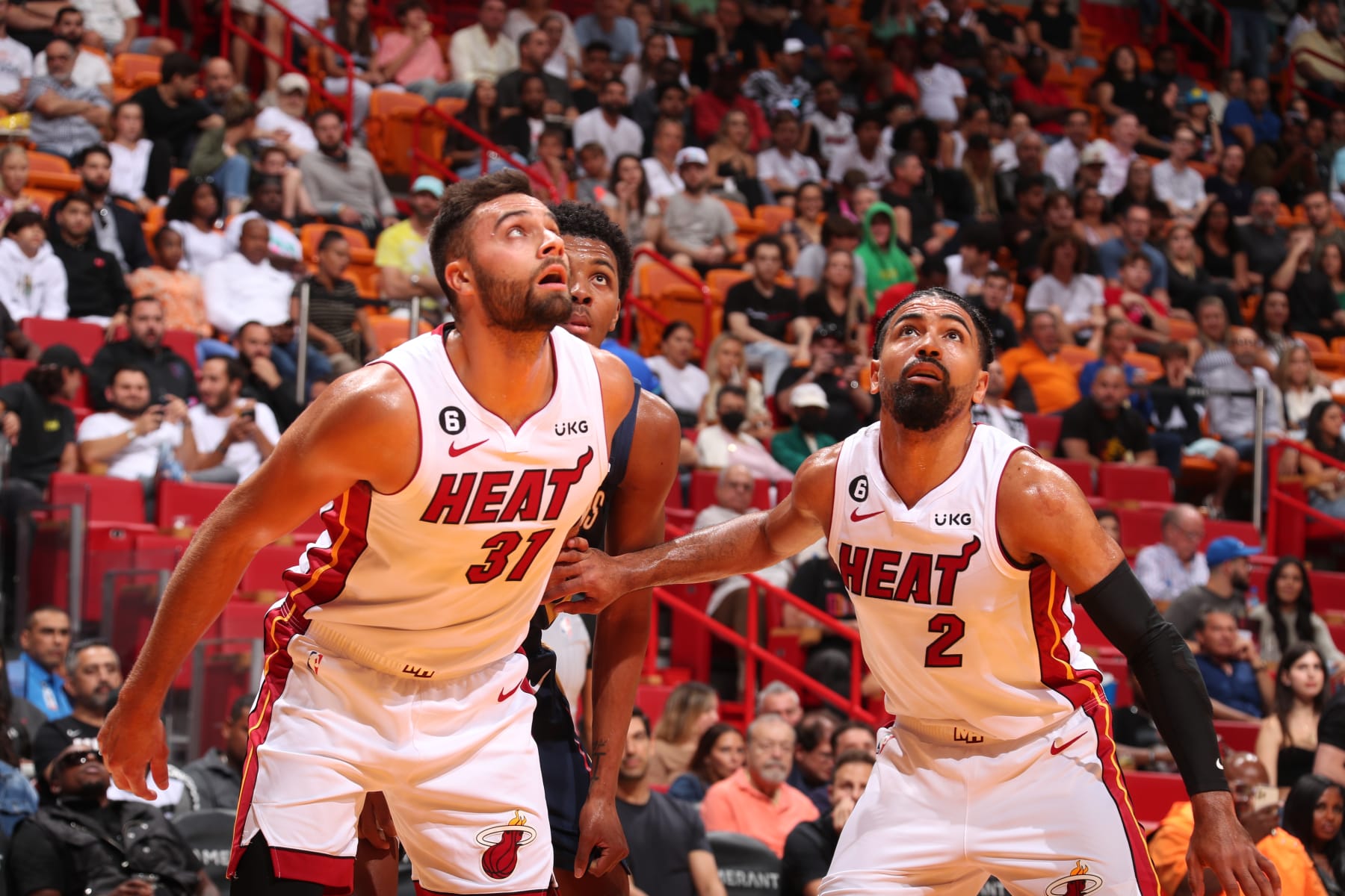 MIAMI, FL - OCTOBER 12: Max Strus #31 of the Miami Heat and Gabe Vincent #2 look on during a preseason game against the New Orleans Pelicans on October 12, 2022 at FTX Arena in Miami, Florida. NOTE TO USER: User expressly acknowledges and agrees that, by downloading and or using this Photograph, user is consenting to the terms and conditions of the Getty Images License Agreement. Mandatory Copyright Notice: Copyright 2022 NBAE (Photo by Issac Baldizon/NBAE via Getty Images)