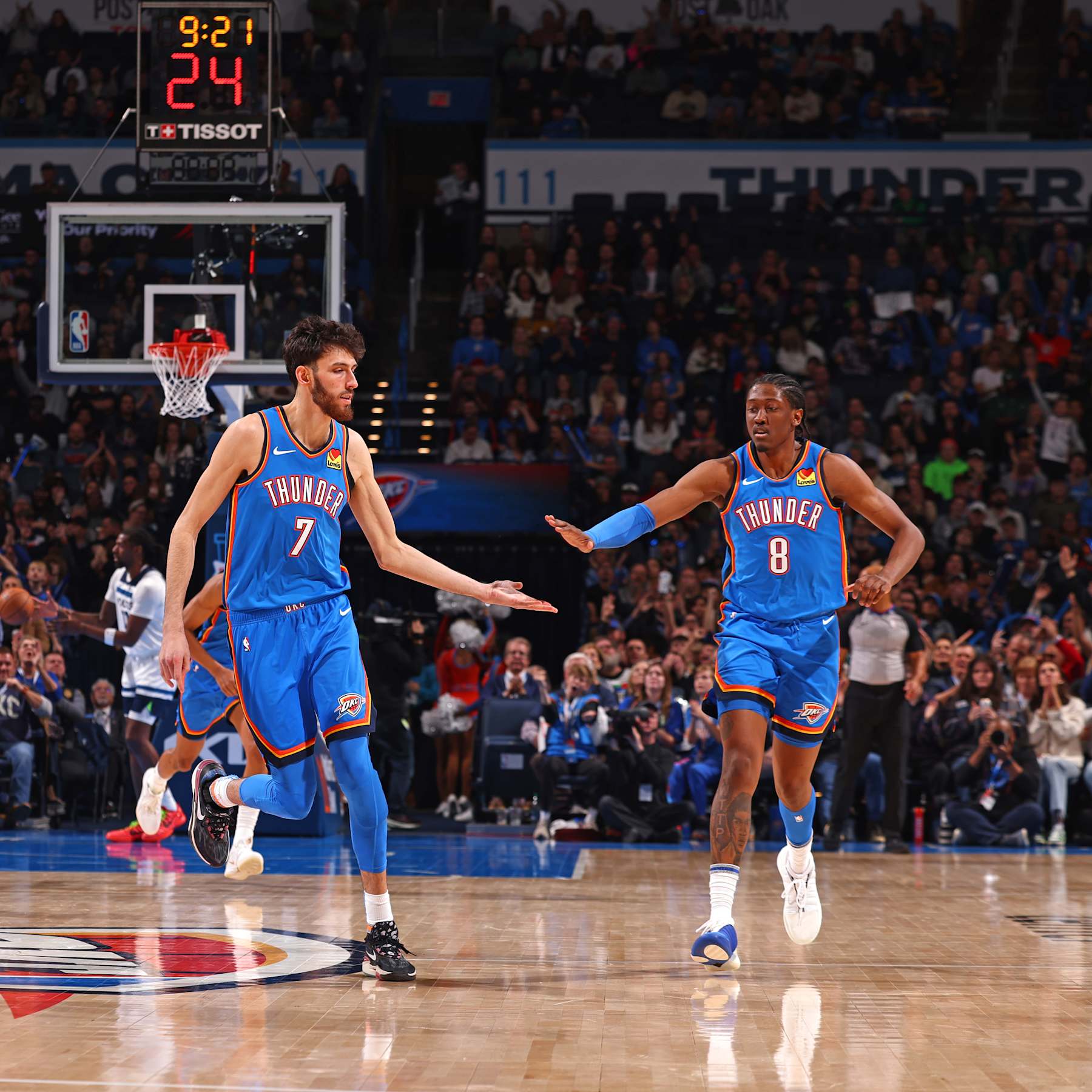 OKLAHOMA CITY, OK - DECEMBER 26: Chet Holmgren #7 high fives Jalen Williams #8 of the Oklahoma City Thunder during the game against the Minnesota Timberwolves on December 26, 2023 at Paycom Arena in Oklahoma City, Oklahoma. NOTE TO USER: User expressly acknowledges and agrees that, by downloading and or using this photograph, User is consenting to the terms and conditions of the Getty Images License Agreement. Mandatory Copyright Notice: Copyright 2023 NBAE (Photo by Zach Beeker/NBAE via Getty Images)