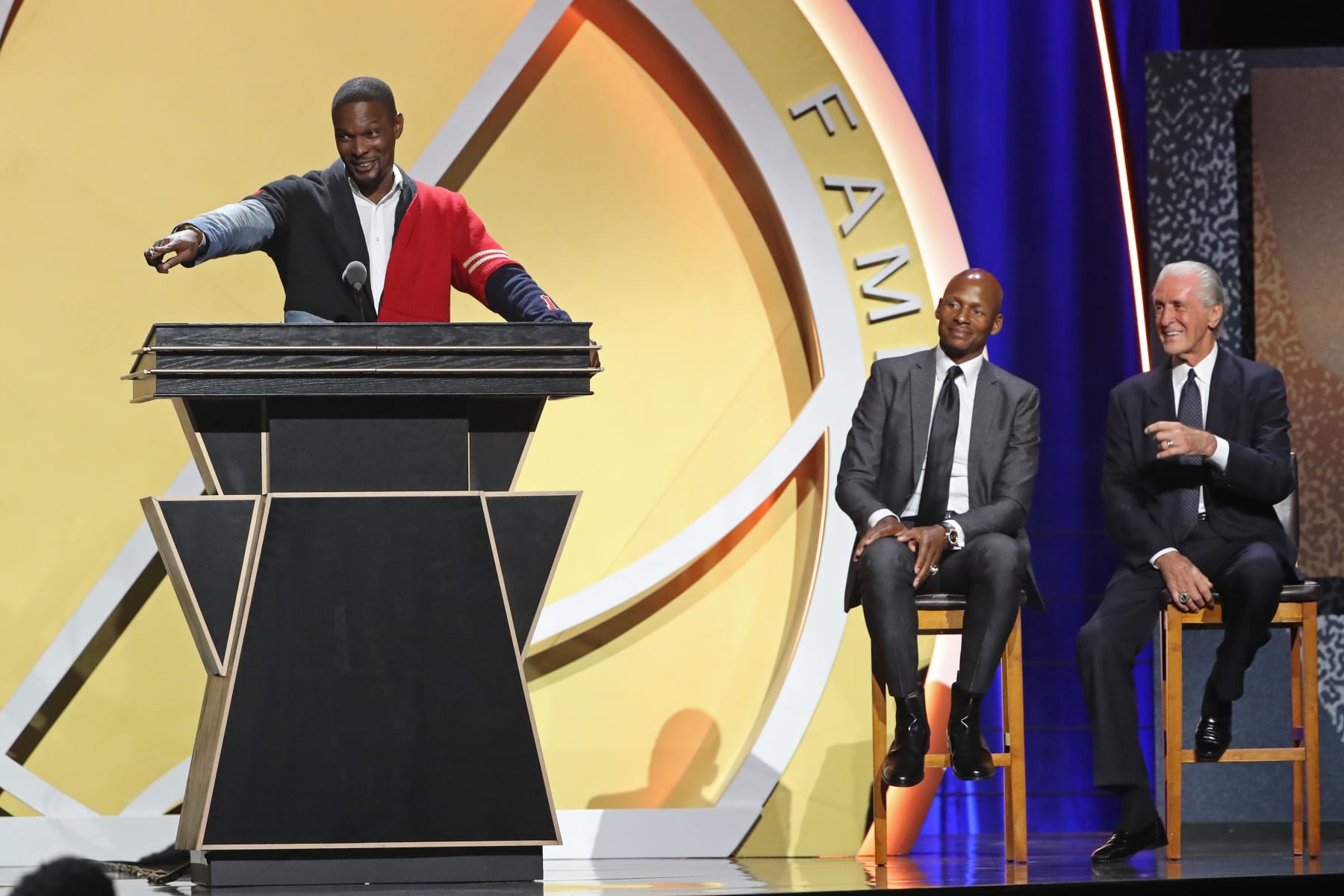 SPRINGFIELD, MA - SEPTEMBER 11: Chris Bosh
speaks to the crowd while presented by Ray Allen and Pat Riley during the 2021 Basketball Hall of Fame Enshrinement Ceremony on September 11, 2021 at MassMutual in Springfield, Massachusetts. NOTE TO USER: User expressly acknowledges and agrees that, by downloading and/or using this photograph, user is consenting to the terms and conditions of the Getty Images License Agreement. Mandatory Copyright Notice: Copyright 2021 NBAE (Photo by Nathaniel S. Butler/NBAE via Getty Images)