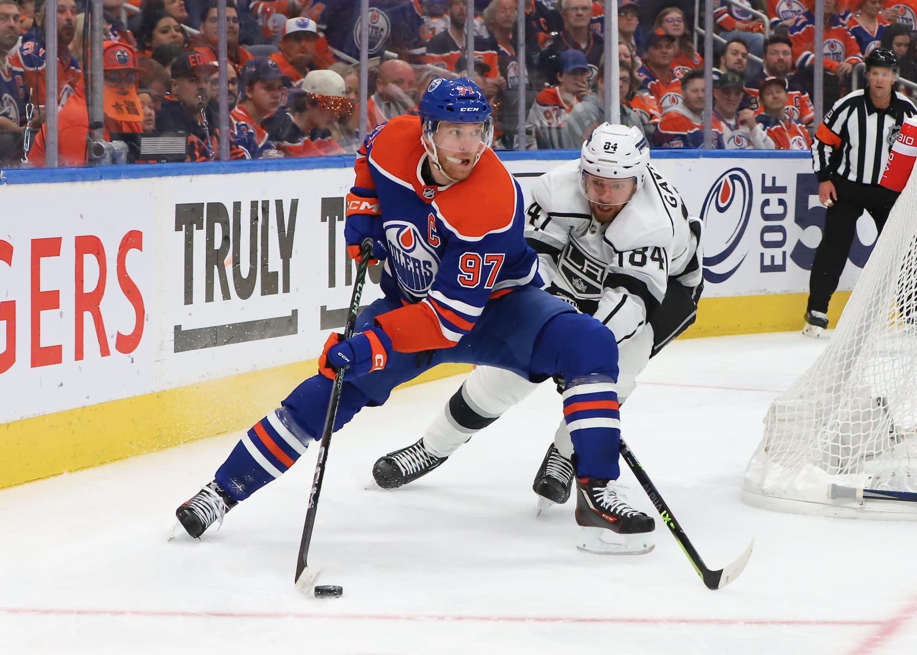 EDMONTON, CANADA - APRIL 19: Connor McDavid #97 of the Edmonton Oilers rushes with the puck in the third period with Vladislav Gavrikov #84 of the Los Angeles Kings in pursuit in Game Two of the First Round of the 2023 Stanley Cup Playoffs on April 19, 2023 at Rogers Place in Edmonton, Alberta, Canada. (Photo by Lawrence Scott/Getty Images)