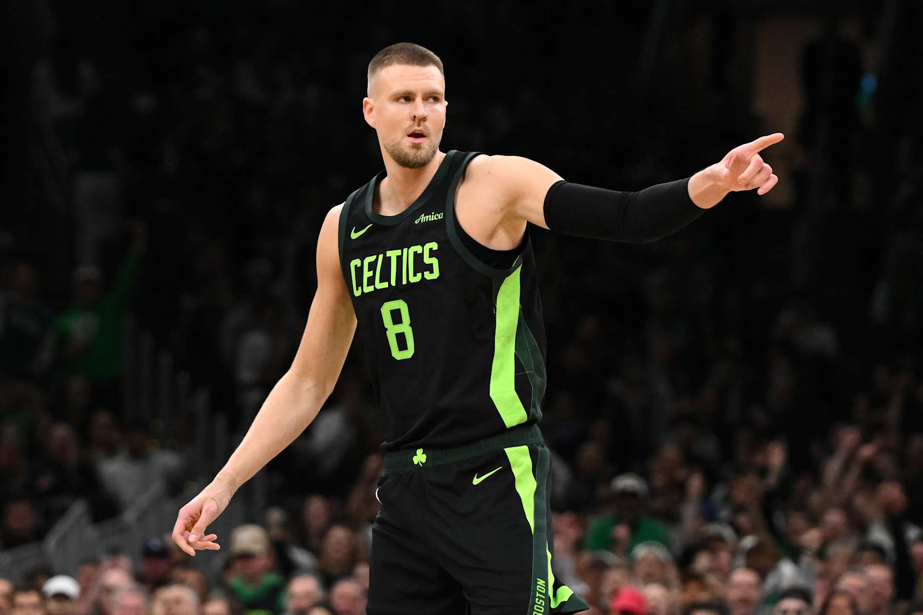 BOSTON, MASSACHUSETTS - NOVEMBER 25: Kristaps Porzingis #8 of the Boston Celtics reacts after making a three-point basket against the LA Clippers during the first quarter at the TD Garden on November 25, 2024 in Boston, Massachusetts. NOTE TO USER: User expressly acknowledges and agrees that, by downloading and or using this photograph, User is consenting to the terms and conditions of the Getty Images License Agreement. (Photo by Brian Fluharty/Getty Images)
