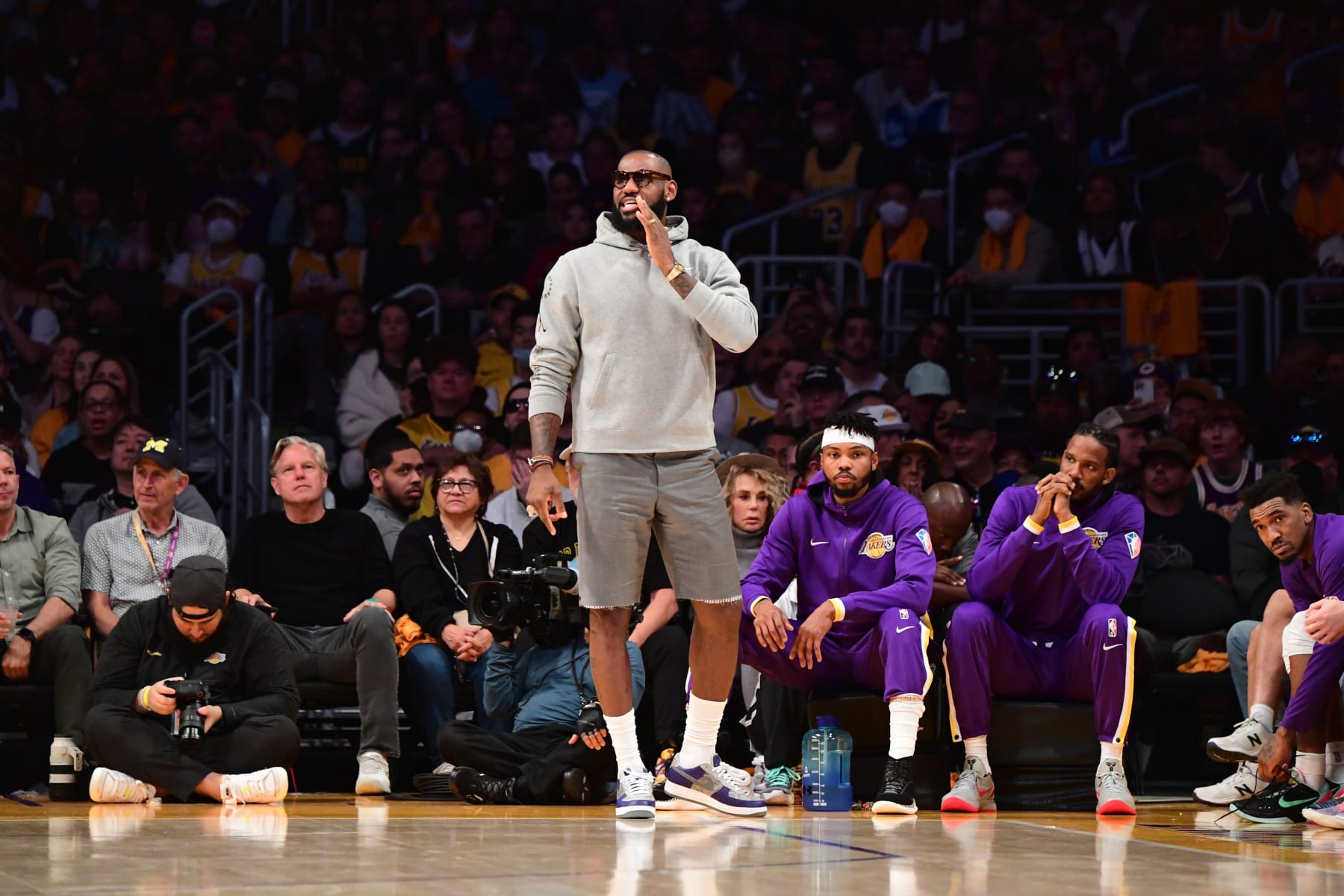 LOS ANGELES, CA - APRIL 3: LeBron James #6 of the Los Angeles Lakers looks on during the game against the Denver Nuggets  on April 3, 2022 at Crypto.Com Arena in Los Angeles, California. NOTE TO USER: User expressly acknowledges and agrees that, by downloading and/or using this Photograph, user is consenting to the terms and conditions of the Getty Images License Agreement. Mandatory Copyright Notice: Copyright 2022 NBAE (Photo by Adam Pantozzi/NBAE via Getty Images)