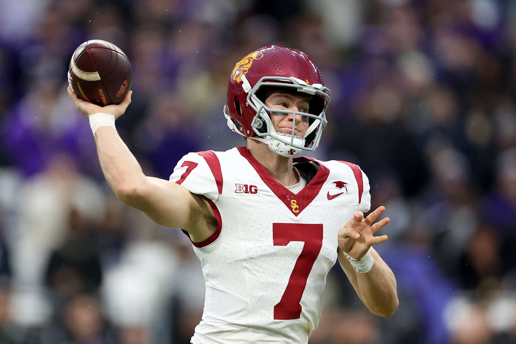 SEATTLE, WASHINGTON - NOVEMBER 02: Miller Moss #7 of the USC Trojans passes against the Washington Huskies during the first half at Husky Stadium on November 02, 2024 in Seattle, Washington. (Photo by Steph Chambers/Getty Images)