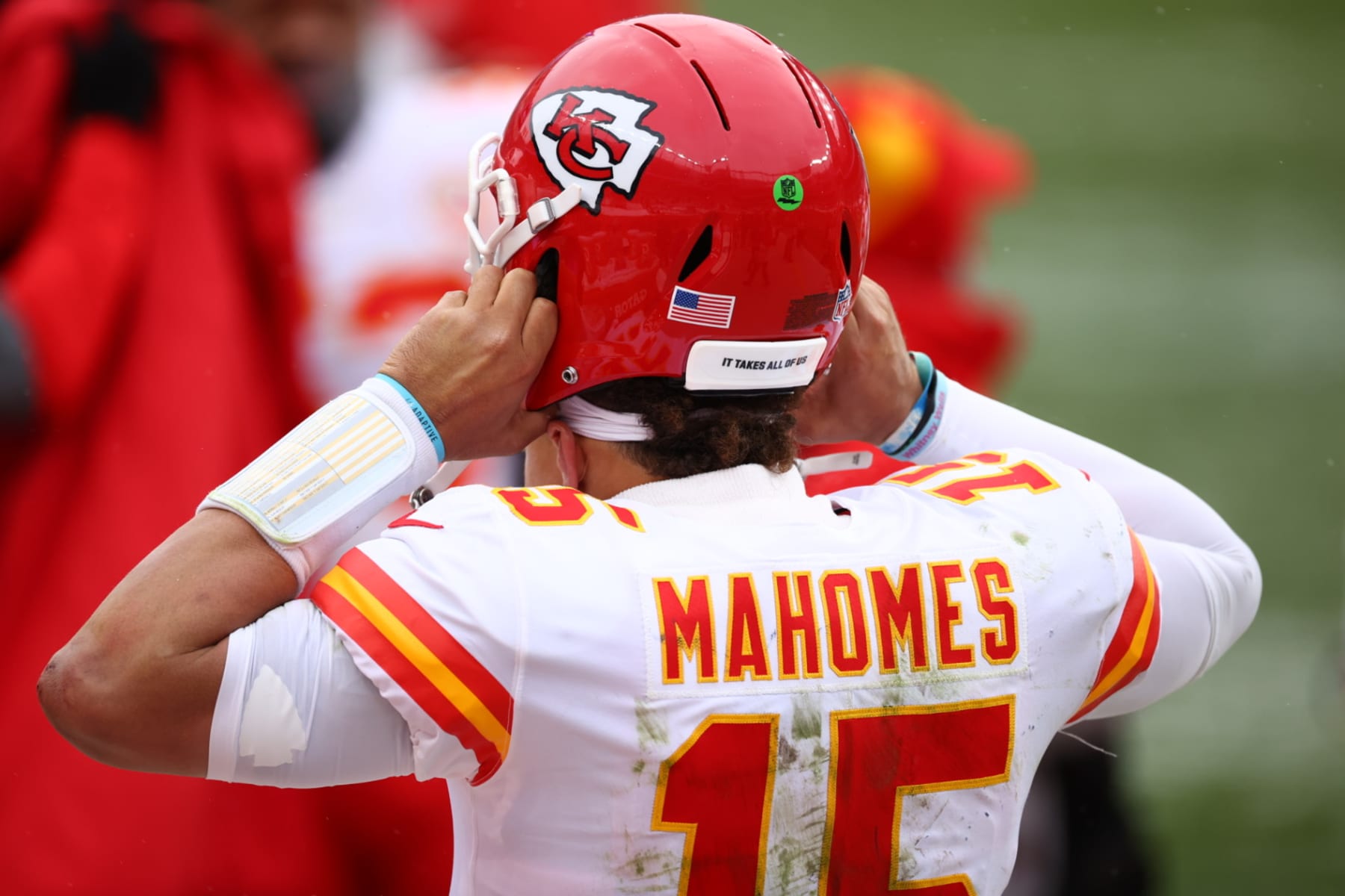 Football: Closeup rear view of of Kansas City Chiefs QB Patrick Mahomes (15) putting on his helmet during game vs Denver Broncos at 
Sports Authority Field. 
Denver, CO 10/25/2020 
CREDIT: Jamie Schwaberow (Photo by Jamie Schwaberow/Sports Illustrated via Getty Images) (Set Number: X163433)