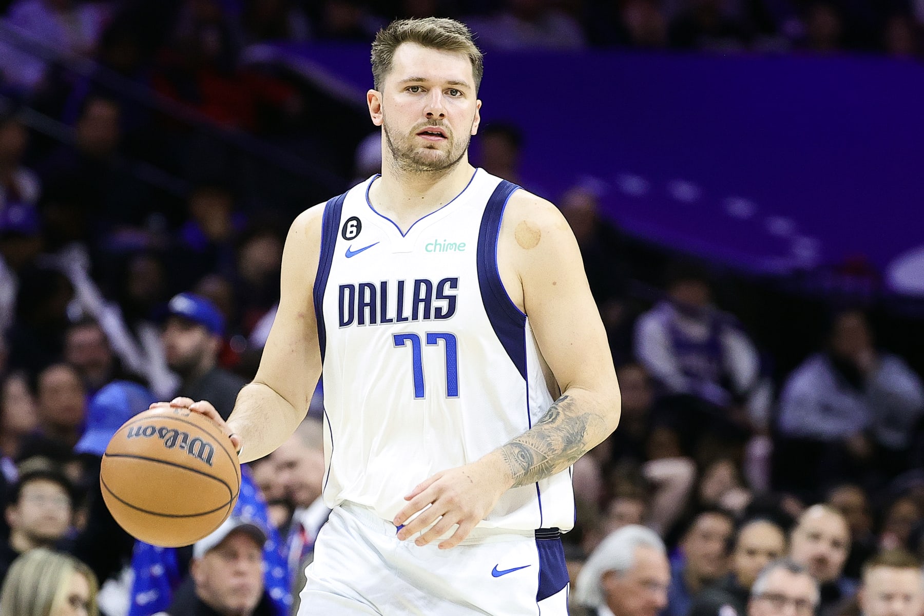 PHILADELPHIA, PENNSYLVANIA - MARCH 29: Luka Doncic #77 of the Dallas Mavericks drivvles during the third quarter against the Philadelphia 76ers at Wells Fargo Center on March 29, 2023 in Philadelphia, Pennsylvania. NOTE TO USER: User expressly acknowledges and agrees that, by downloading and or using this photograph, User is consenting to the terms and conditions of the Getty Images License Agreement. (Photo by Tim Nwachukwu/Getty Images)