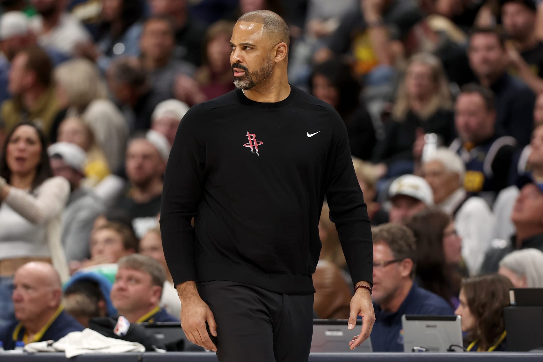 DENVER, COLORADO - NOVEMBER 29: Head coach Ime Udoka of the Houston Rockets watches as his team plays the Denver Nuggets in the third quarter at Ball Arena on November 29, 2023 in Denver, Colorado. NOTE TO USER: User expressly acknowledges and agrees that, by downloading and or using this photograph, User is consenting to the terms and conditions of the Getty Images License Agreement. (Photo by Matthew Stockman/Getty Images)