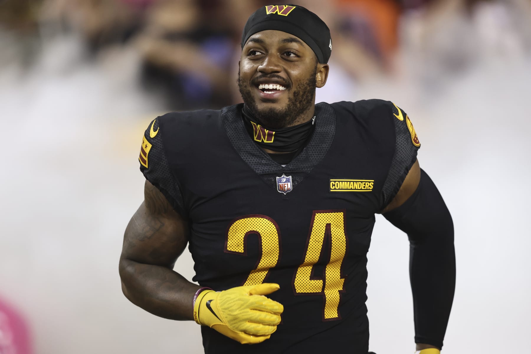 LANDOVER, MARYLAND - OCTOBER 05: Antonio Gibson #24 of the Washington Commanders takes the field prior to an NFL football game between the Washington Commanders and the Chicago Bears at FedExField on October 05, 2023 in Landover, Maryland. (Photo by Michael Owens/Getty Images)