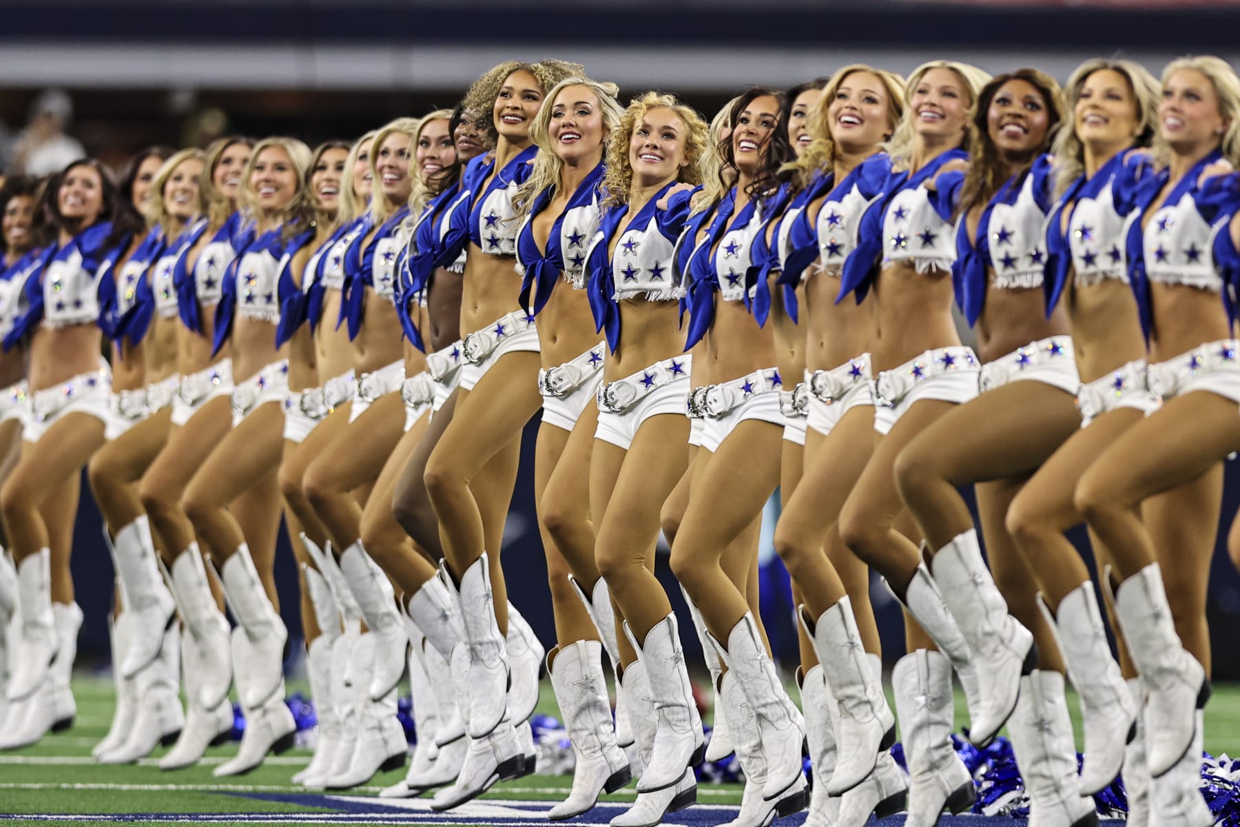 ARLINGTON, TX - JANUARY 14: The Dallas Cowboys Cheerleaders perform during the NFC Wild Card game between the Dallas Cowboys and the Green Bay Packers on January 14, 2024 at AT&T Stadium in Arlington, Texas. (Photo by Matthew Pearce/Icon Sportswire via Getty Images)