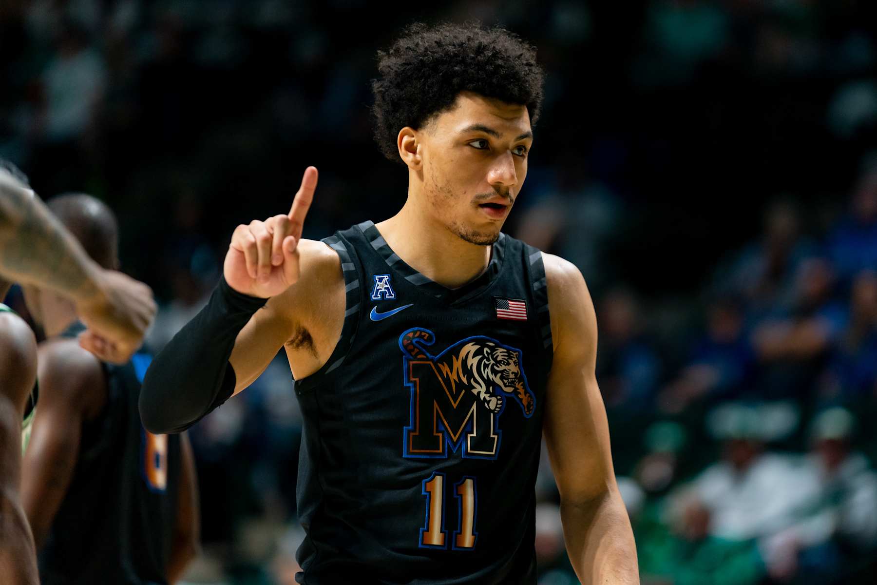 DENTON, TX - FEBRUARY 15:Memphis Tigers guard Jahvon Quinerly (11) holds up one finger during a college basketball game between Memphis Tigers and the North Texas Mean Green on February 15, 2024 at The Super Pit in Denton, TX. (Photo by Chris Leduc/Icon Sportswire via Getty Images)