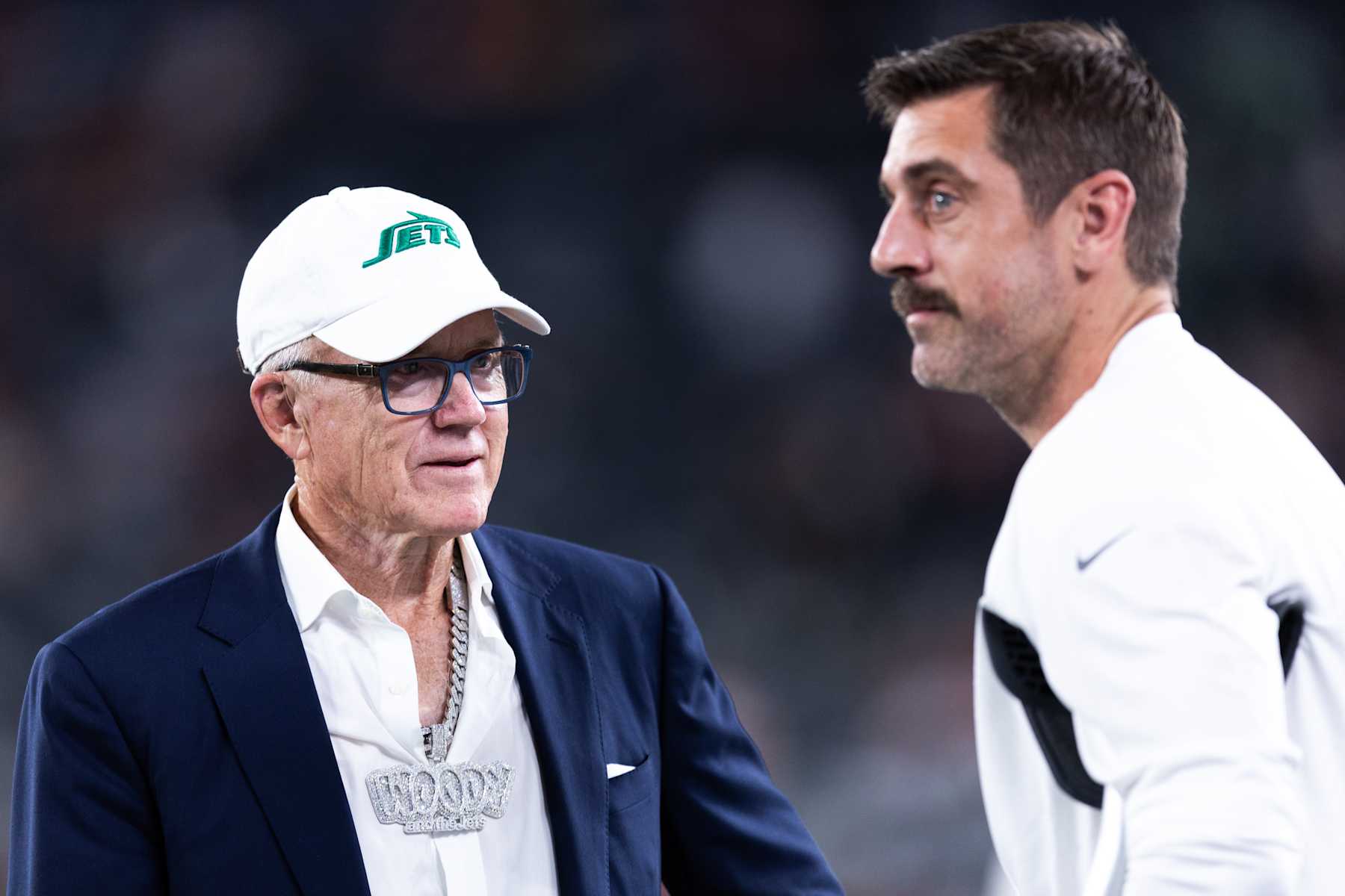EAST RUTHERFORD, NEW JERSEY - OCTOBER 01: (L-R) New York Jets owner Woody Johnson talks with Aaron Rodgers #8 of the New York Jets prior to the game against the Kansas City Chiefs at MetLife Stadium on October 01, 2023 in East Rutherford, New Jersey. (Photo by Dustin Satloff/Getty Images)