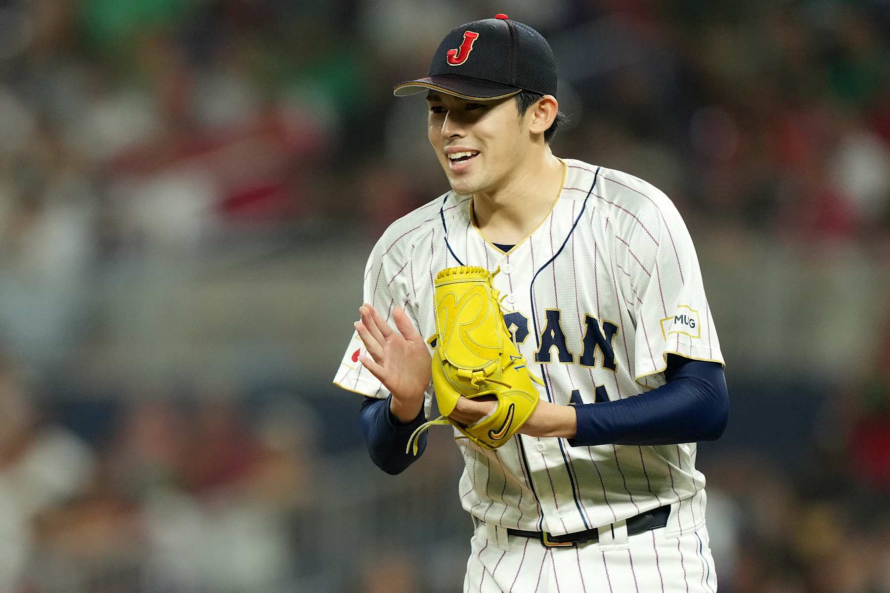 MIAMI, FLORIDA - MARCH 20: Roki Sasaki #14 of Team Japan reacts after an out in the third inning against Team Mexico during the World Baseball Classic Semifinals at loanDepot park on March 20, 2023 in Miami, Florida. (Photo by Eric Espada/Getty Images)