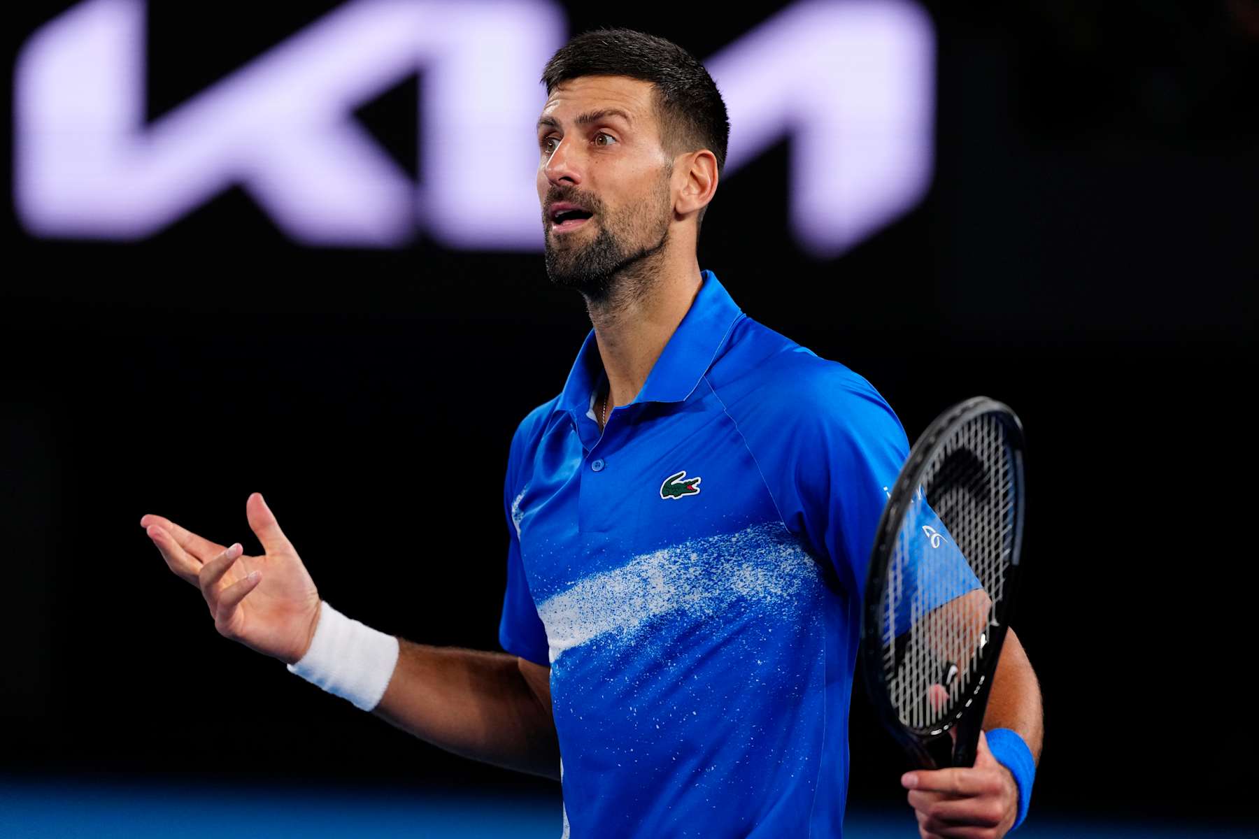MELBOURNE, AUSTRALIA - JANUARY 19: Novak Djokovic of Serbia in action against Jiri Lehecka of the Czech Republic in the in the Men's Singles Fourth Round match during day eight of the 2025 Australian Open at Melbourne Park on January 19, 2025 in Melbourne, Australia. (Photo by Fred Lee/Getty Images)