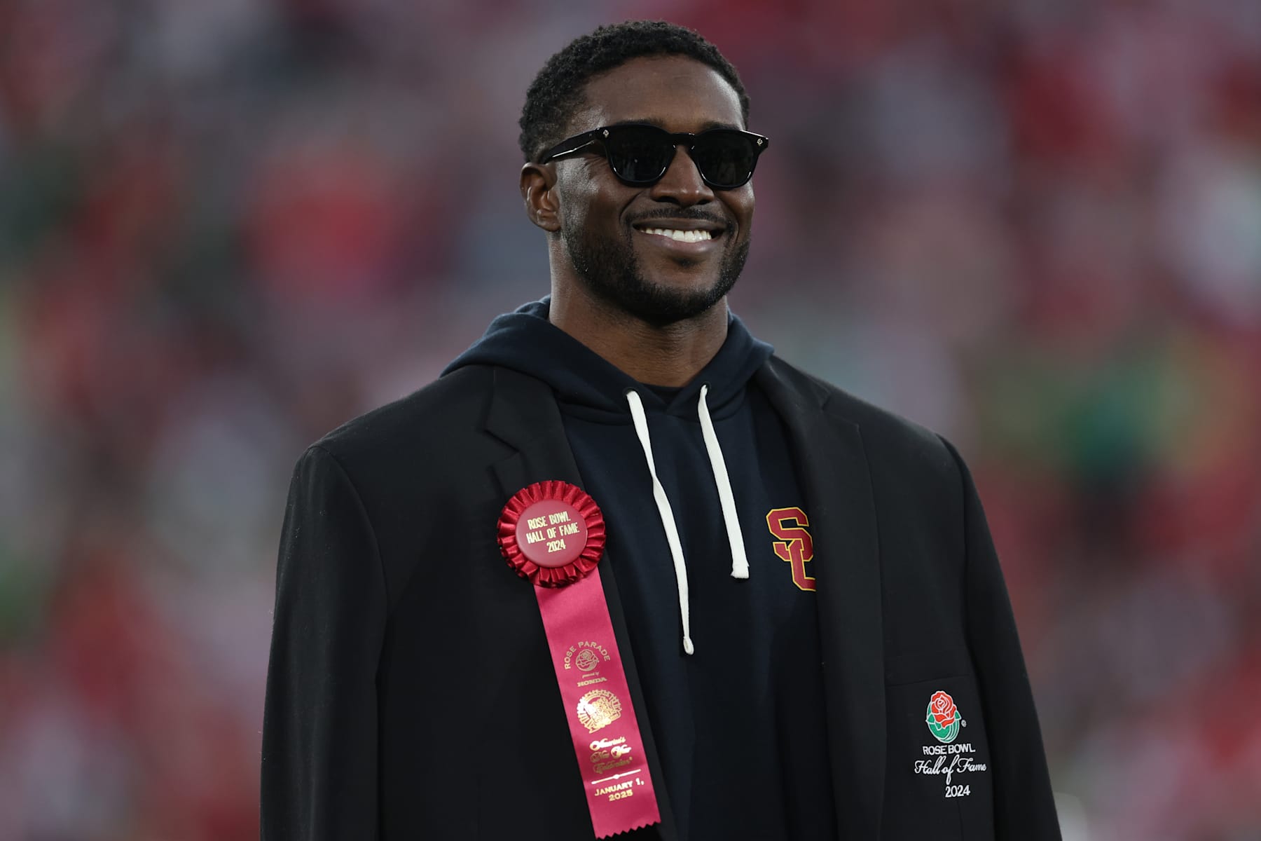 PASADENA, CALIFORNIA - JANUARY 01: Reggie Bush looks on after being inducted into the Rose Bowl Hall of Fame in the game between the Ohio State Buckeyes and the Oregon Ducks during the Rose Bowl Game Presented by Prudential at Rose Bowl Stadium on January 01, 2025 in Pasadena, California. (Photo by Harry How/Getty Images)