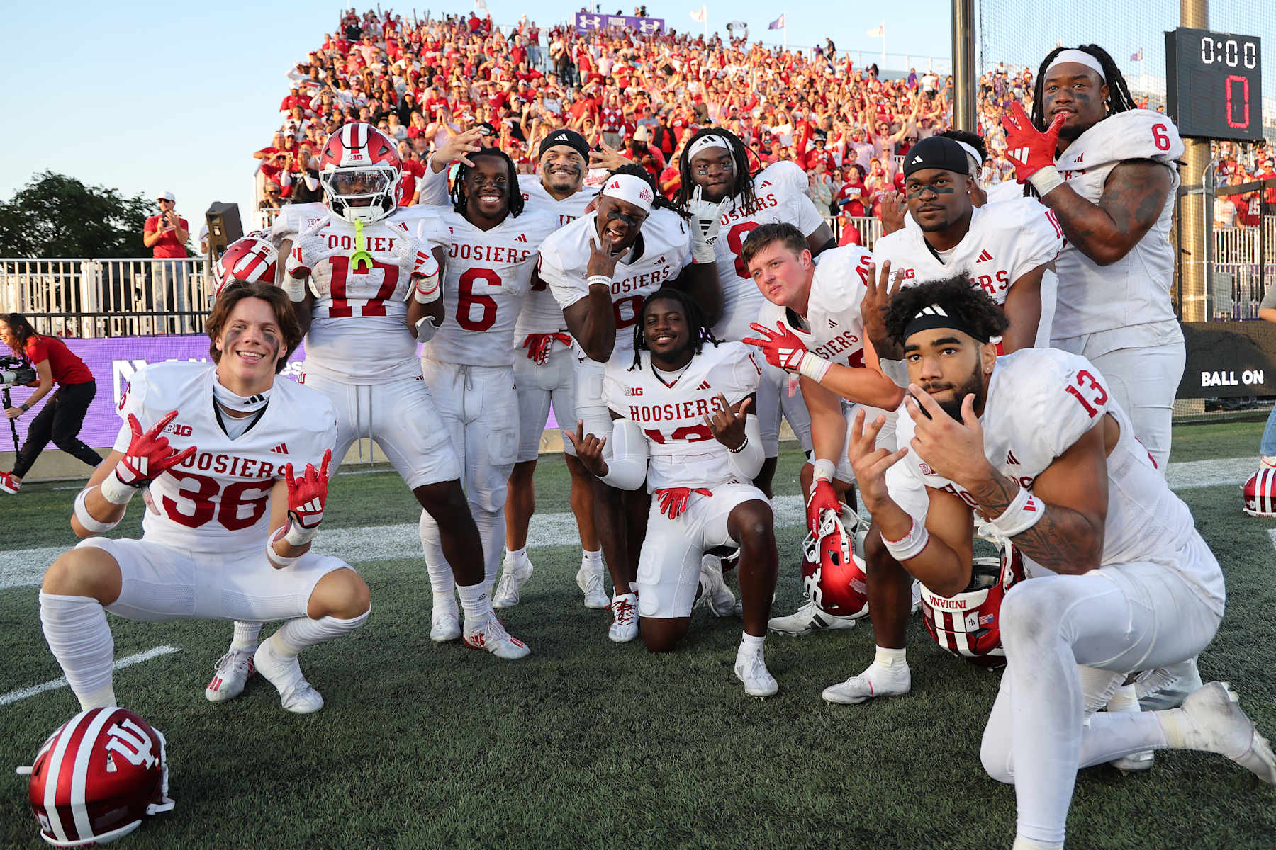 EVANSTON, ILLINOIS - OCTOBER 05: The Indiana Hoosiers celebrate after defeating the Northwestern Wildcats during the second half at Martin Stadium on October 05, 2024 in Evanston, Illinois. (Photo by Michael Reaves/Getty Images)