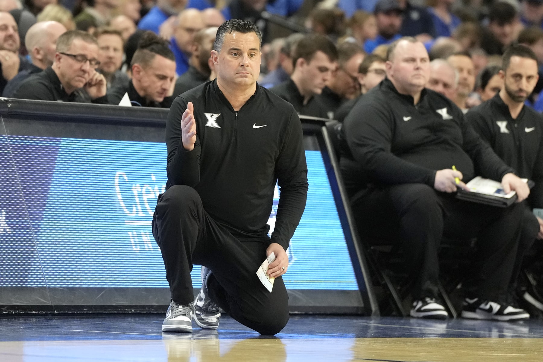 OMAHA, NE - JANUARY 23:  Head coach Sean Miller of the Xavier Musketeers signals to his players during a college basketball game against the Creighton Bluejays at the CHI Health Center on January 23, 2024 in Omaha, Nebraska.  (Photo by Mitchell Layton/Getty Images)
