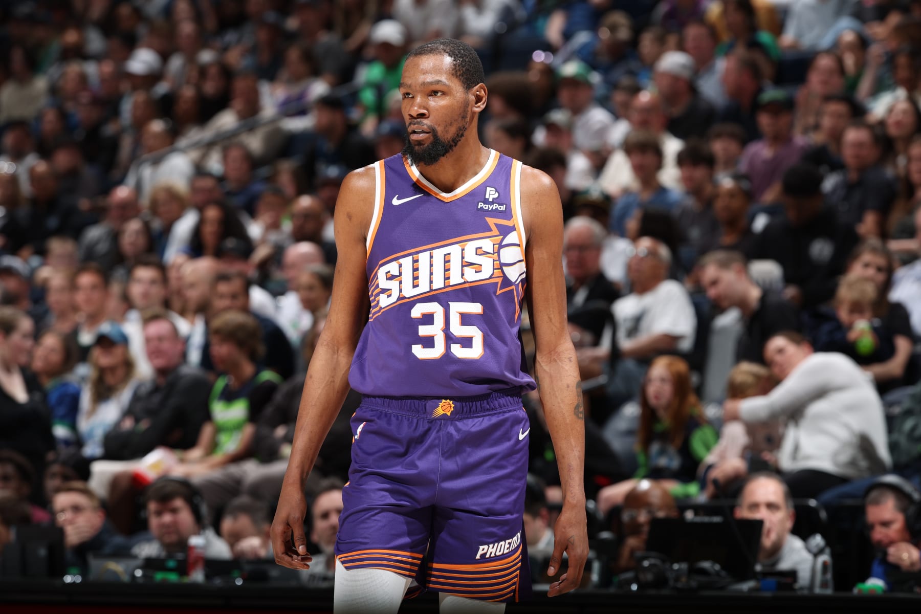 MINNEAPOLIS, MN -  APRIL 14: Kevin Durant #35 of the Phoenix Suns looks on during the game against the Minnesota Timberwolves on April 14, 2024 at Target Center in Minneapolis, Minnesota. NOTE TO USER: User expressly acknowledges and agrees that, by downloading and or using this Photograph, user is consenting to the terms and conditions of the Getty Images License Agreement. Mandatory Copyright Notice: Copyright 2024 NBAE (Photo by David Sherman/NBAE via Getty Images)