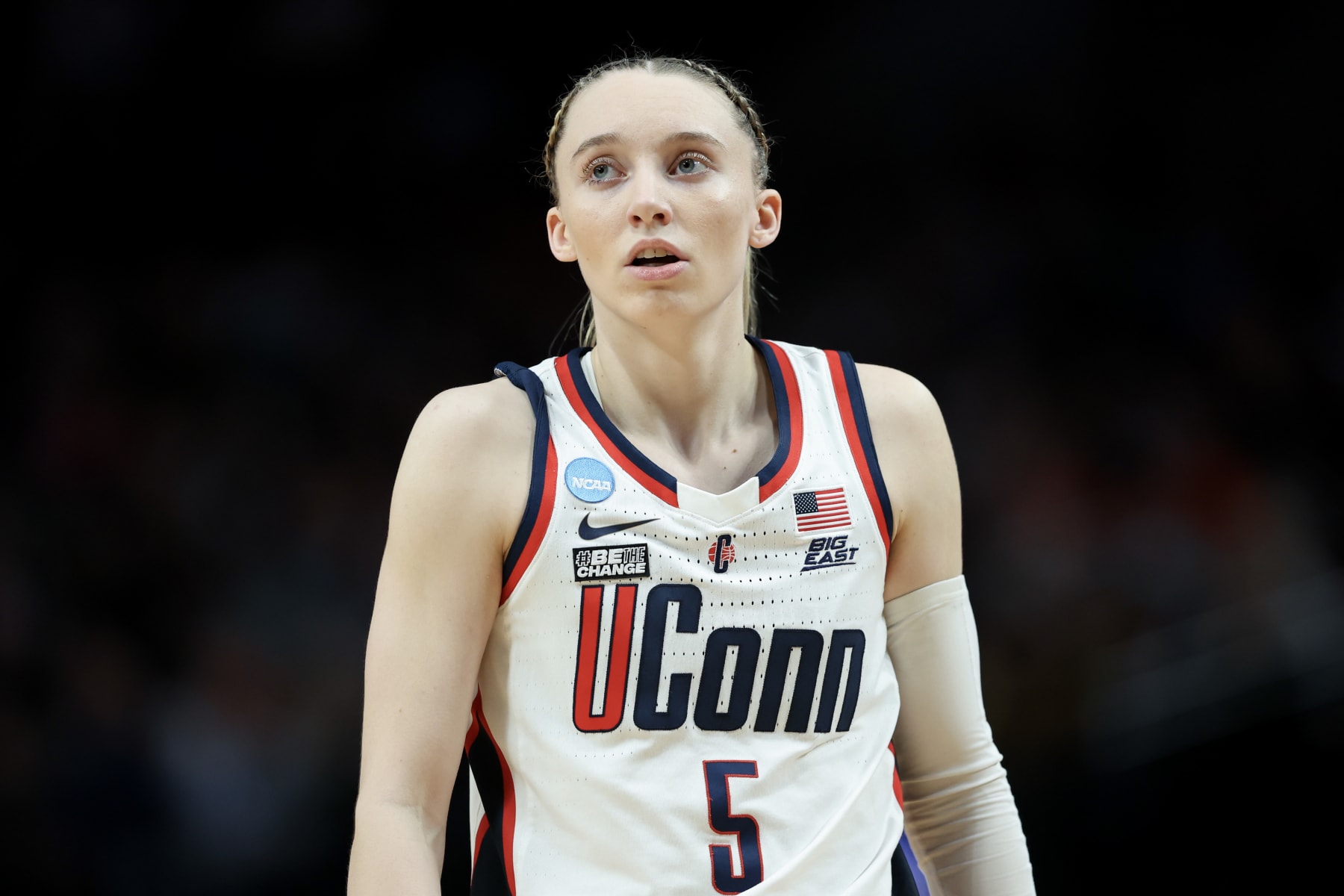 PORTLAND, OREGON - MARCH 30: Paige Bueckers #5 of the Connecticut Huskies looks on during the second half against the Duke Blue Devilsin the Sweet 16 round of the NCAA Women's Basketball Tournament at Moda Center on March 30, 2024 in Portland, Oregon. (Photo by Steph Chambers/Getty Images) PORTLAND, OREGON - MARCH 30: Paige Bueckers #5 of the Connecticut Huskies looks on during the second half against the Duke Blue Devilsin the Sweet 16 round of the NCAA Women's Basketball Tournament at Moda Center on March 30, 2024 in Portland, Oregon. (Photo by Steph Chambers/Getty Images)