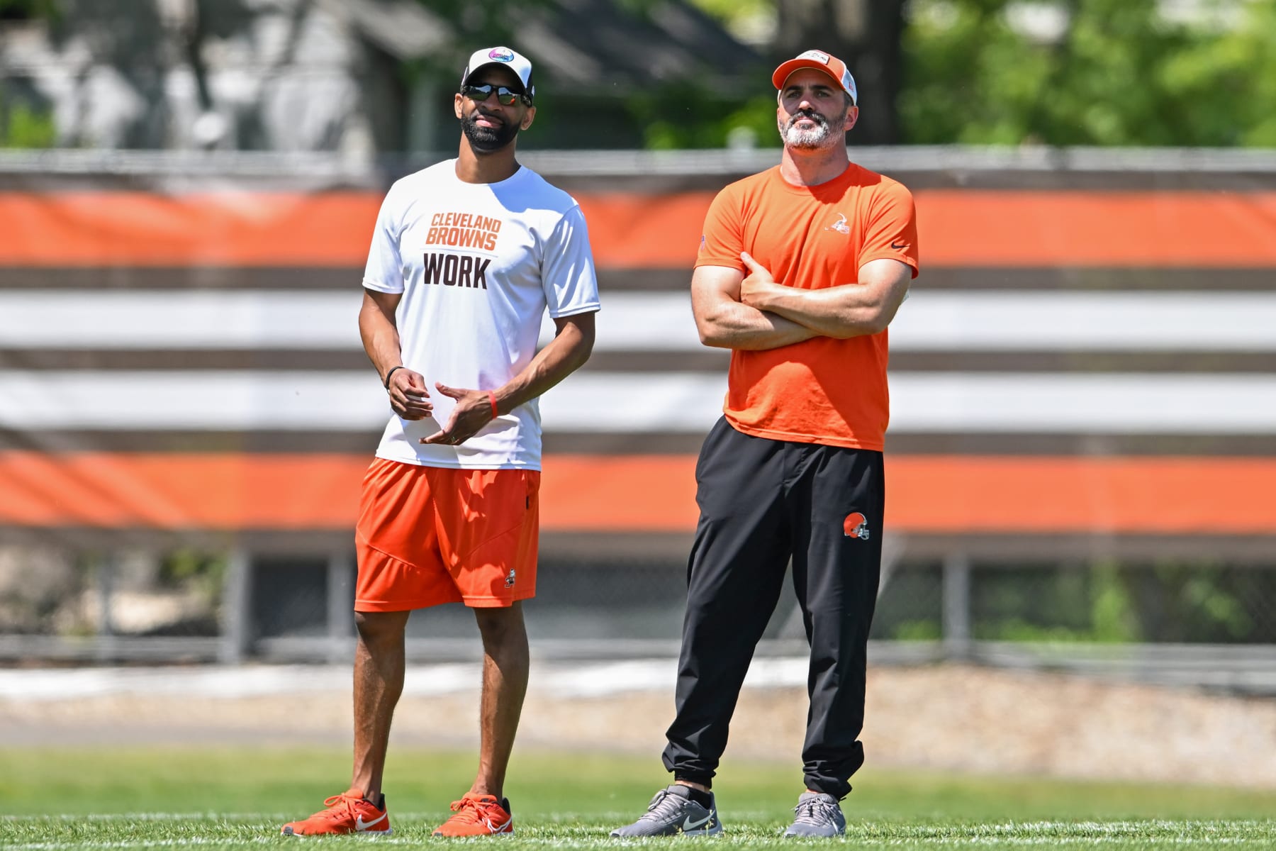 BEREA, OHIO - MAY 31: Executive vice president, football operations & general manager Andrew Berry of the Cleveland Browns (L) talks with head coach Kevin Stefanski during the Cleveland Browns OTAs at CrossCountry Mortgage Campus on May 31, 2023 in Berea, Ohio. (Photo by Nick Cammett/Diamond Images via Getty Images)