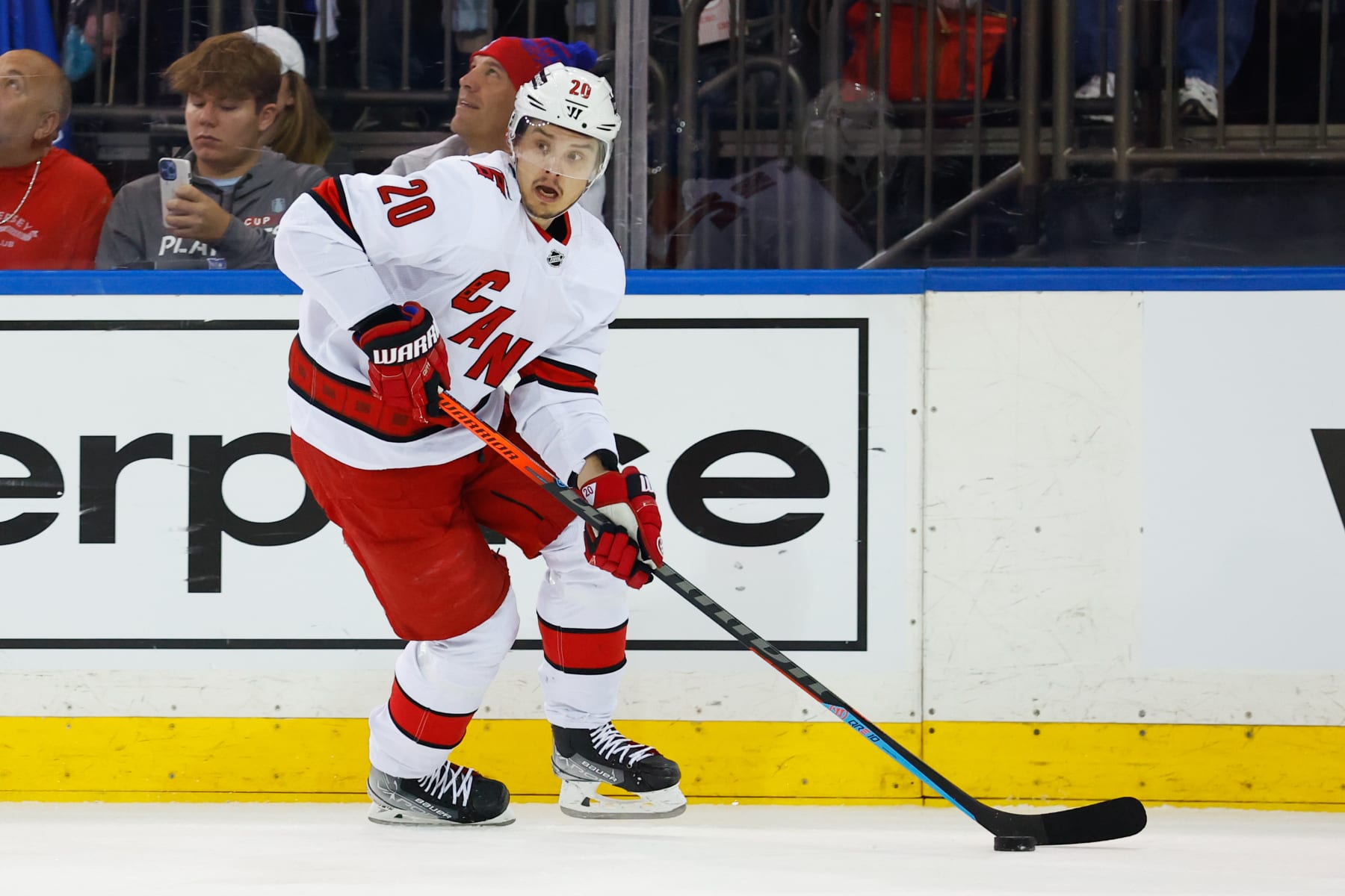 NEW YORK, NY - MAY 28:  Carolina Hurricanes center Sebastian Aho (20) controls the puck against the New York Rangers during Game 6 of round 2 of the Stanley Cup playoffs on May 28, 2022 at Madison Square Garden in New York, New York.   (Photo by Rich Graessle/Icon Sportswire via Getty Images)