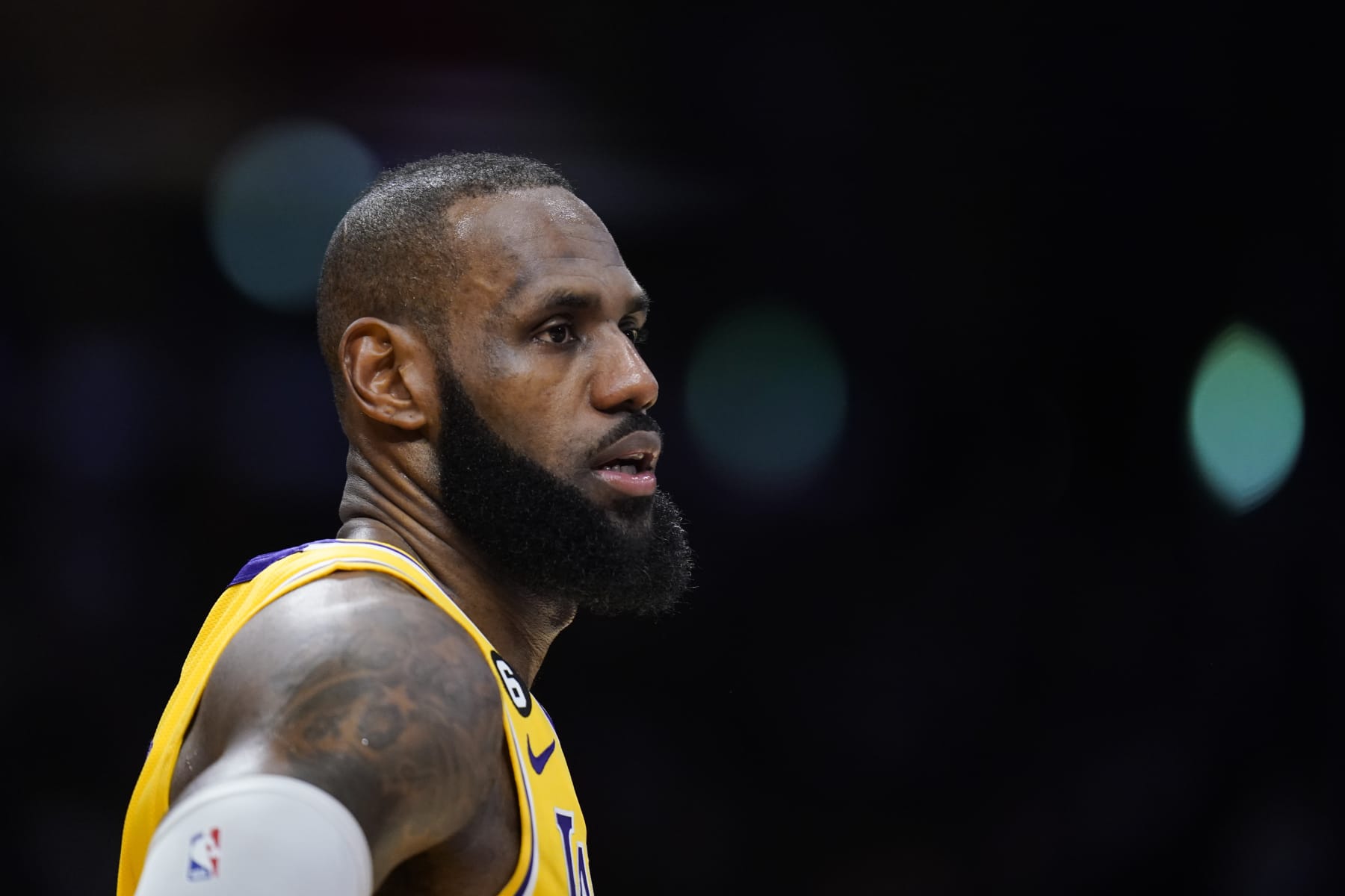 Los Angeles Lakers' LeBron James watches during the first half of an NBA basketball game against the Dallas Mavericks Thursday, Jan. 12, 2023, in Los Angeles. (AP Photo/Jae C. Hong)