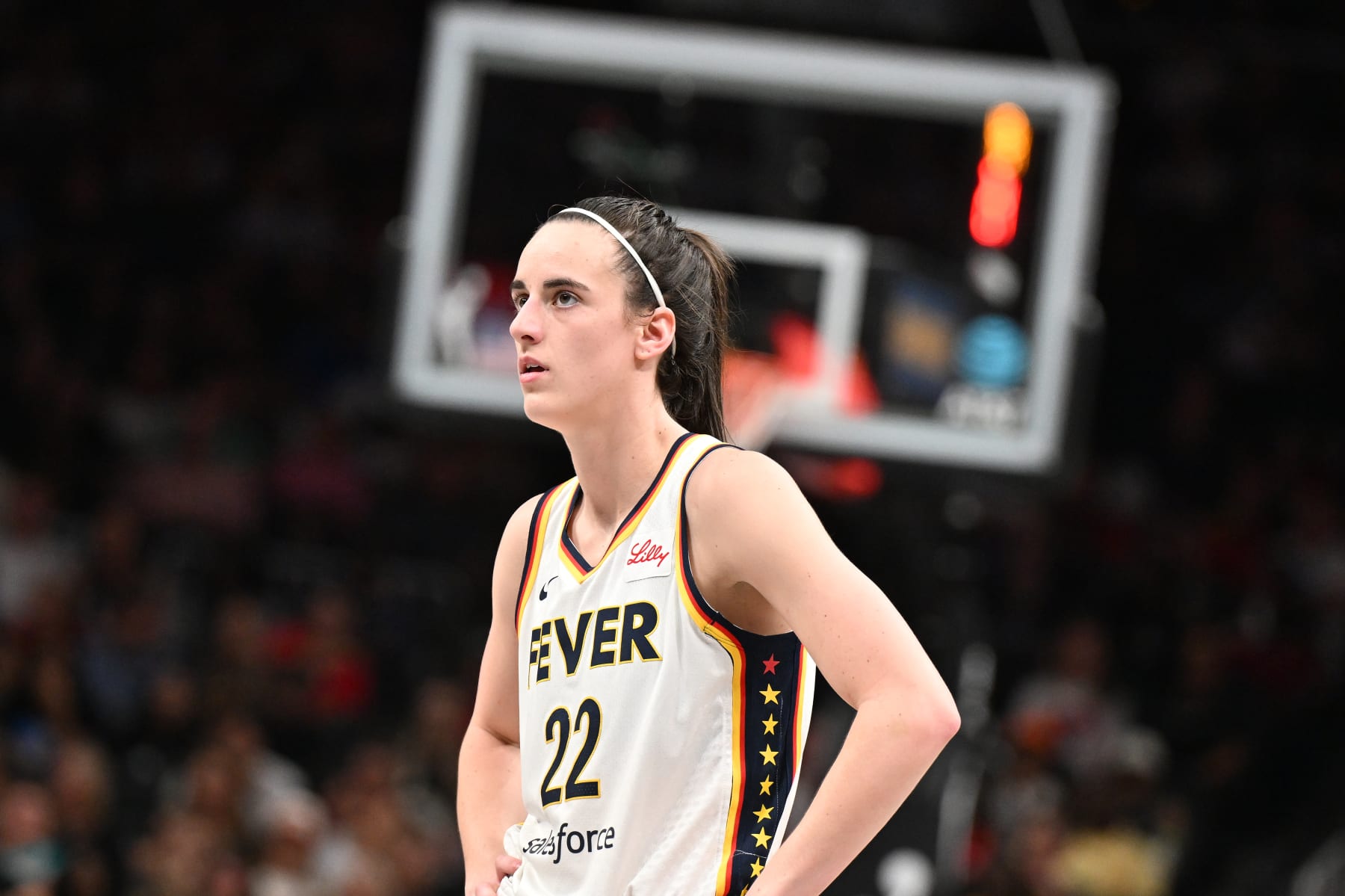 ATLANTA, GEORGIA - JUNE 21: Caitlin Clark #22 of the Indiana Fever looks on during the game against the Atlanta Dream at State Farm Arena on June 21, 2024 in Atlanta, Georgia. NOTE TO USER: User expressly acknowledges and agrees that, by downloading and or using this photograph, User is consenting to the terms and conditions of the Getty Images License Agreement.  (Photo by Paras Griffin/Getty Images)