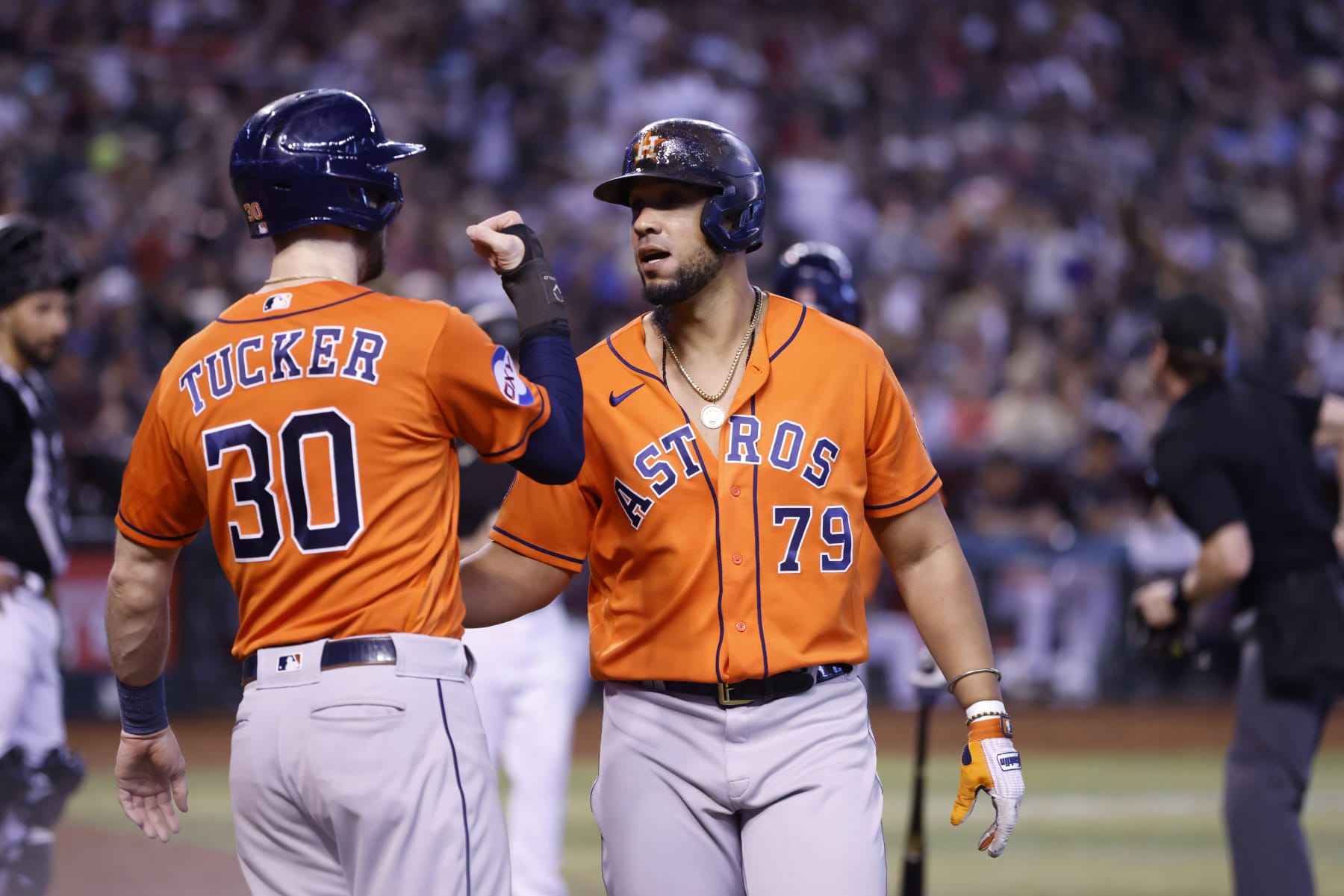 PHOENIX, ARIZONA - OCTOBER 01: Jose Abreu #79 of the Houston Astros celebrates with Kyle Tucker #30 after hitting a two-run home run during the seventh inning against the Arizona Diamondbacks at Chase Field on October 01, 2023 in Phoenix, Arizona. (Photo by Chris Coduto/Getty Images)