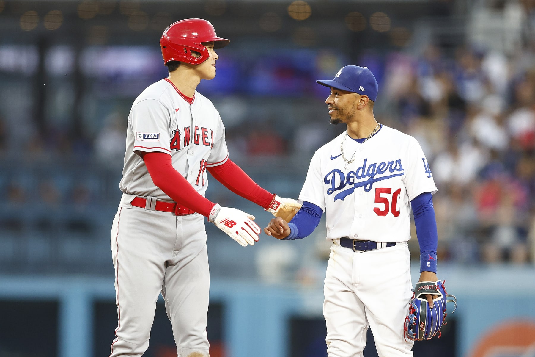 LOS ANGELES, CALIFORNIA - JULY 07:  Mookie Betts #50 of the Los Angeles Dodgers and Shohei Ohtani #17 of the Los Angeles Angels in the fourth inning at Dodger Stadium on July 07, 2023 in Los Angeles, California. (Photo by Ronald Martinez/Getty Images)
