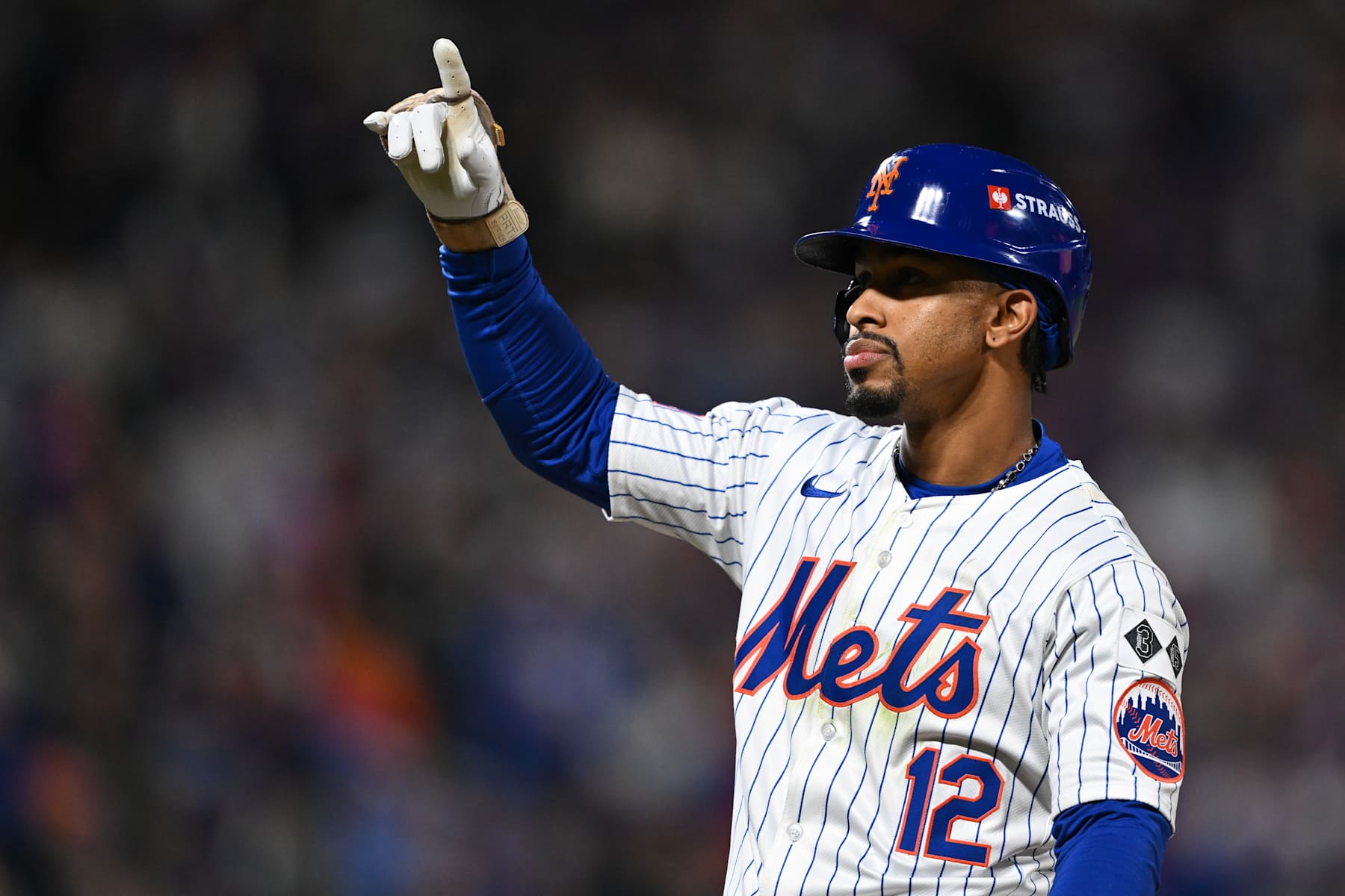 NEW YORK, NY - OCTOBER 17:   Francisco Lindor #12 of the New York Mets reacts after hitting a single in the third inning during Game 4 of the NLCS presented by loanDepot between the Los Angeles Dodgers and the New York Mets at Citi Field on Thursday, October 17, 2024 in New York, New York. (Photo by Drew Hallowell/MLB Photos via Getty Images)