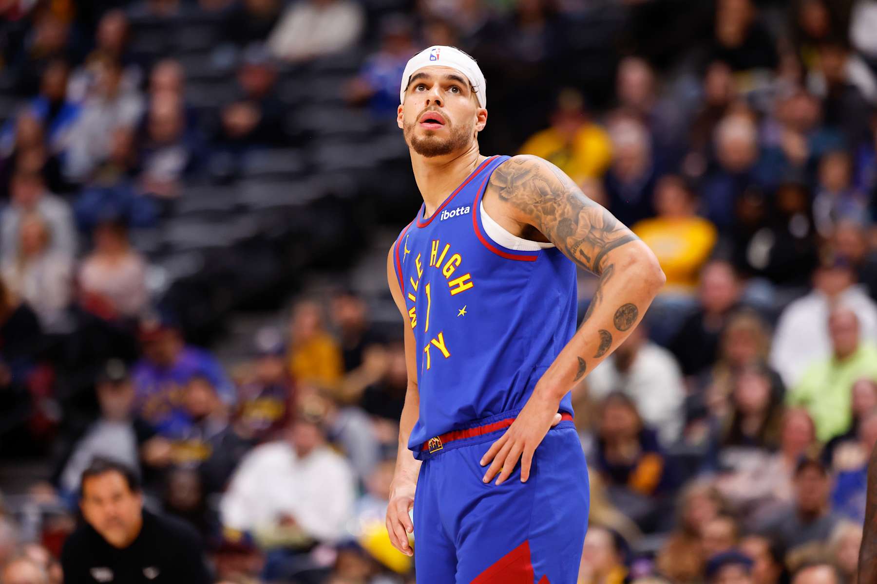 DENVER, COLORADO - NOVEMBER 8: Michael Porter Jr. #1 of the Denver Nuggets looks on against the Miami Heat at Ball Arena on November 8, 2024 in Denver, Colorado. NOTE TO USER: User expressly acknowledges and agrees that, by downloading and or using this photograph, User is consenting to the terms and conditions of the Getty Images License Agreement. (Photo by C. Morgan Engel/Getty Images)