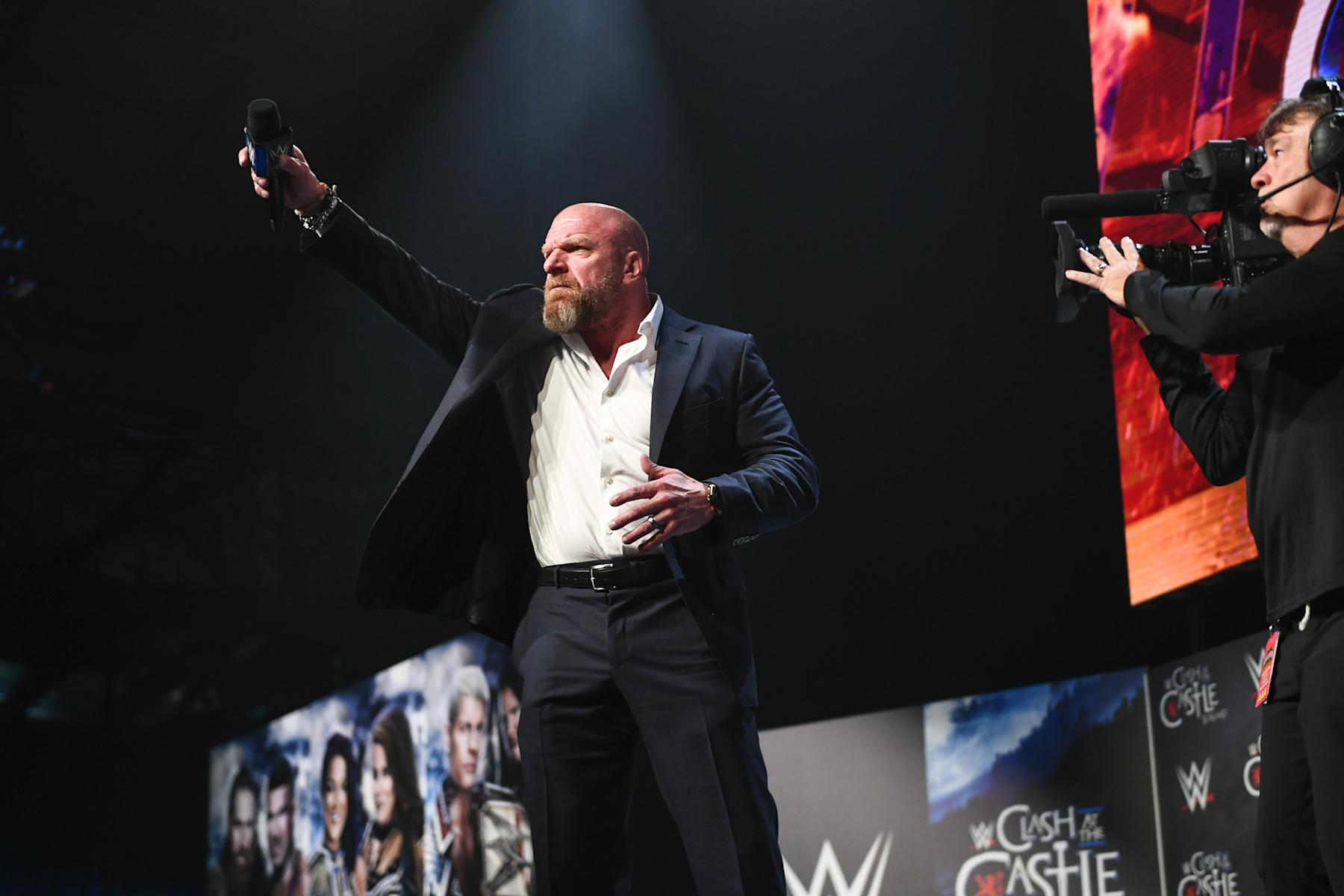 GLASGOW, SCOTLAND - JUNE 14: Triple H speaks during WWE Clash at the Castle Kickoff in SEC Centre Hall at the Scottish Event Campus on June 14, 2024 in Glasgow, Scotland. (Photo by WWE/Getty Images)