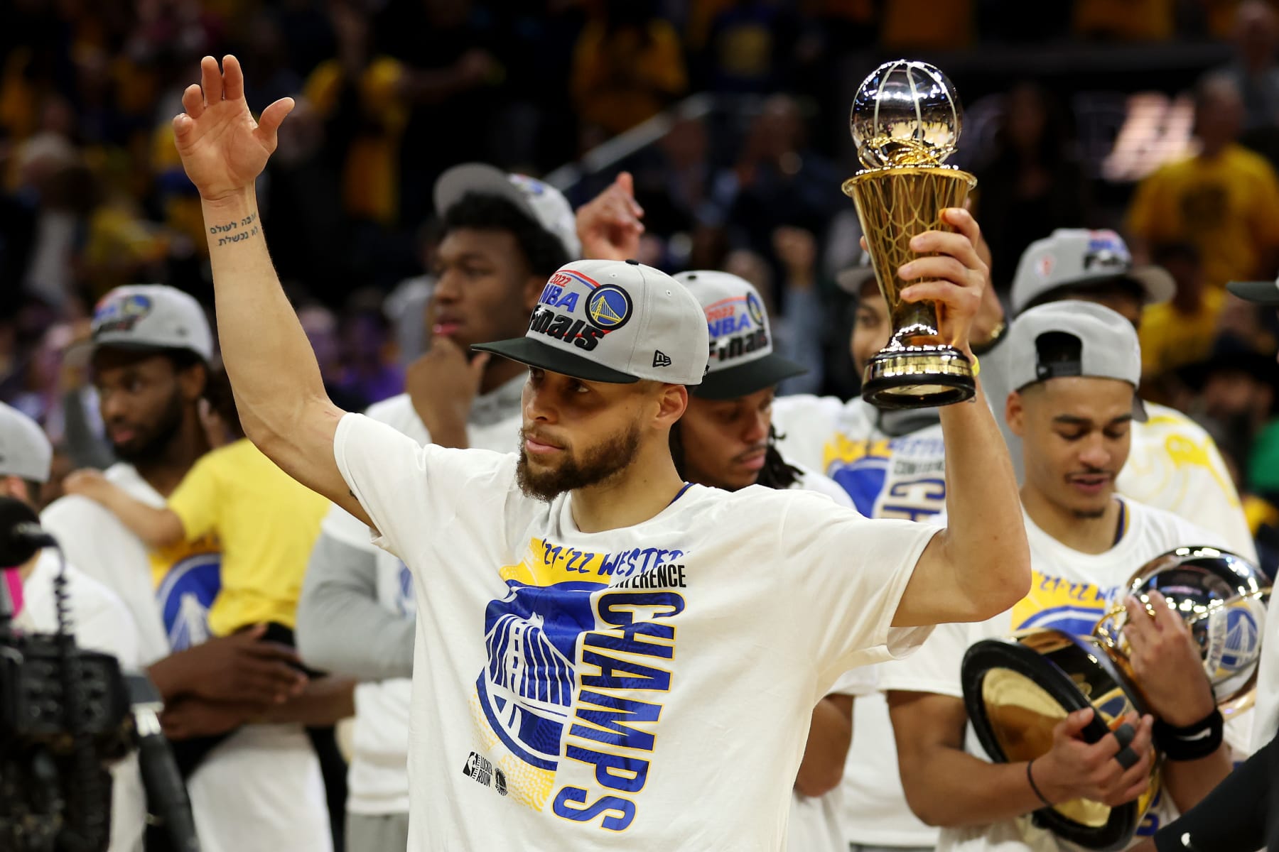 SAN FRANCISCO, CALIFORNIA - MAY 26: Stephen Curry #30 of the Golden State Warriors celebrates after winning the Magic Johnson Western Conference Finals MVP award after a 120-110 win against the Dallas Mavericks in Game Five of the 2022 NBA Playoffs Western Conference Finals at Chase Center on May 26, 2022 in San Francisco, California. NOTE TO USER: User expressly acknowledges and agrees that, by downloading and or using this photograph, User is consenting to the terms and conditions of the Getty Images License Agreement. (Photo by Ezra Shaw/Getty Images)