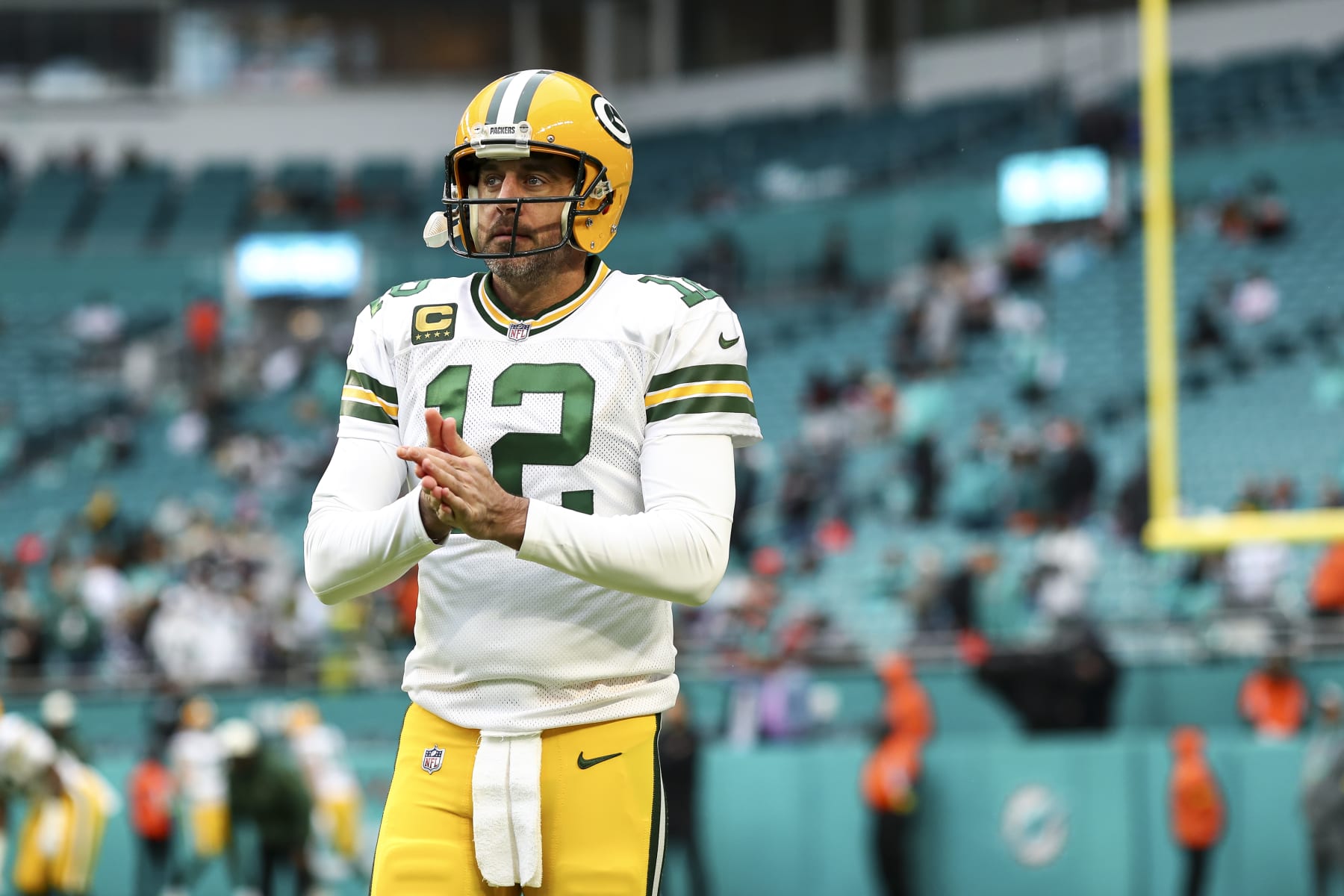 MIAMI GARDENS, FL - DECEMBER 25: Aaron Rodgers #12 of the Green Bay Packers warms up prior to an NFL football game against the Miami Dolphins at Hard Rock Stadium on December 25, 2022 in Miami Gardens, Florida. (Photo by Kevin Sabitus/Getty Images)