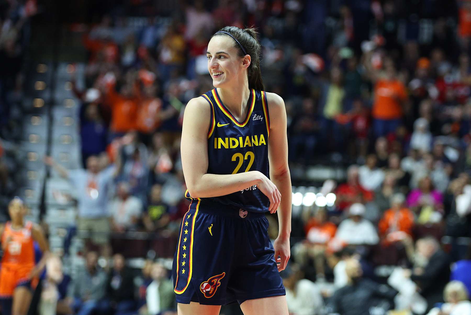 UNCASVILLE, CT - SEPTEMBER 22: Indiana Fever guard Caitlin Clark (22) smiles during the First Round and game 1 of the 2024 WNBA playoffs between Indiana Fever and Connecticut Sun on September 22, 2024, at Mohegan Sun Arena in Uncasville, CT. (Photo by M. Anthony Nesmith/Icon Sportswire via Getty Images)