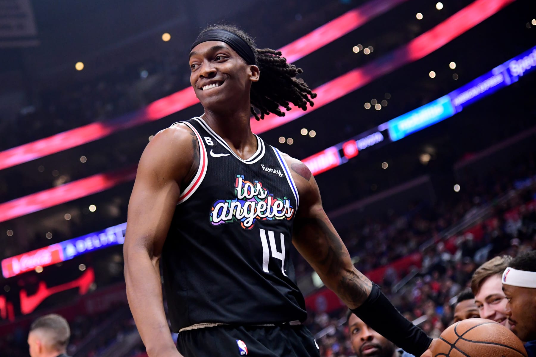 LOS ANGELES, CA - JANUARY 13: Terance Mann #14 of the LA Clippers smiles during the game against the Denver Nuggets on January 13, 2023 at Crypto.Com Arena in Los Angeles, California. NOTE TO USER: User expressly acknowledges and agrees that, by downloading and/or using this Photograph, user is consenting to the terms and conditions of the Getty Images License Agreement. Mandatory Copyright Notice: Copyright 2023 NBAE (Photo by Adam Pantozzi/NBAE via Getty Images)