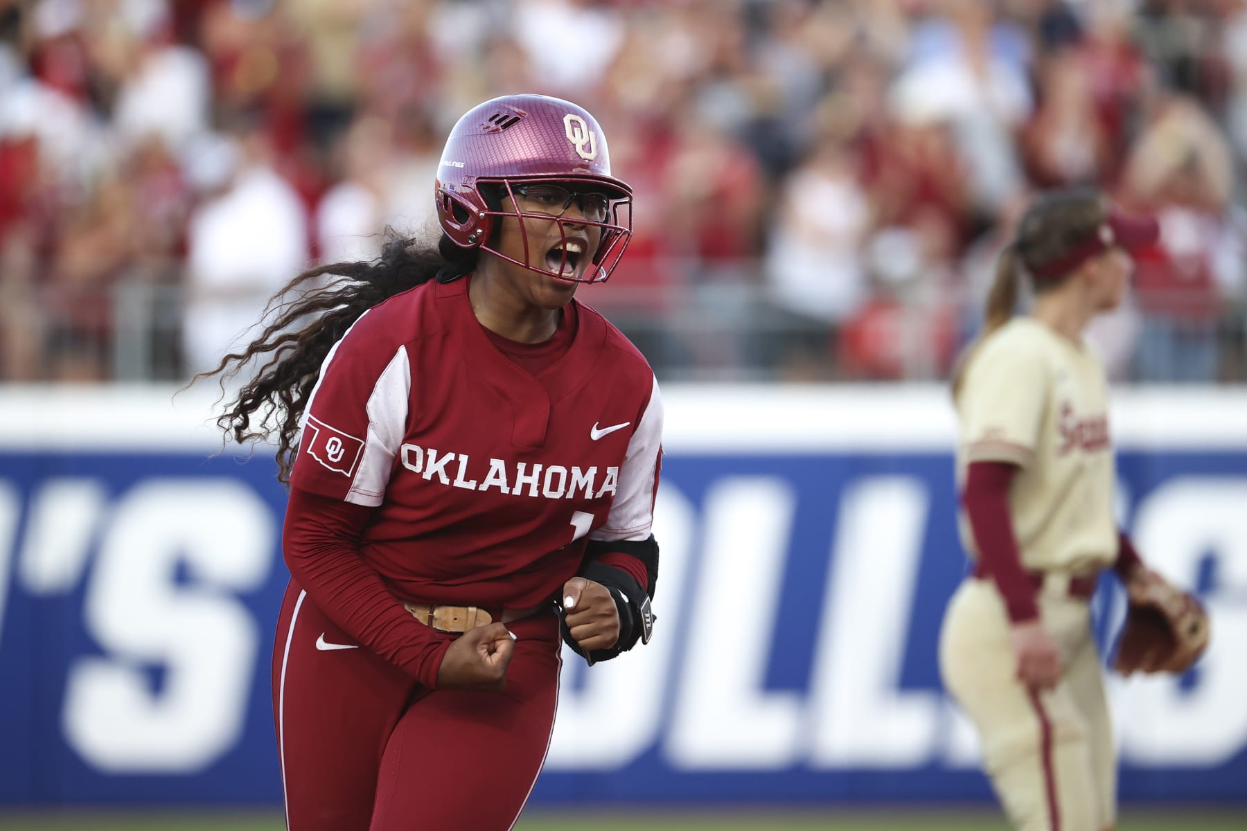 OKLAHOMA CITY, OK - JUNE 08: Cydney Sanders #1 of the Oklahoma Sooners reacts to hitting a home run against the Florida State Seminoles during the Division I Women's Softball Championship held at USA Softball Hall of Fame Stadium on June 8, 2023 in Oklahoma City, Oklahoma. (Photo by Tyler Schank/NCAA Photos via Getty Images)