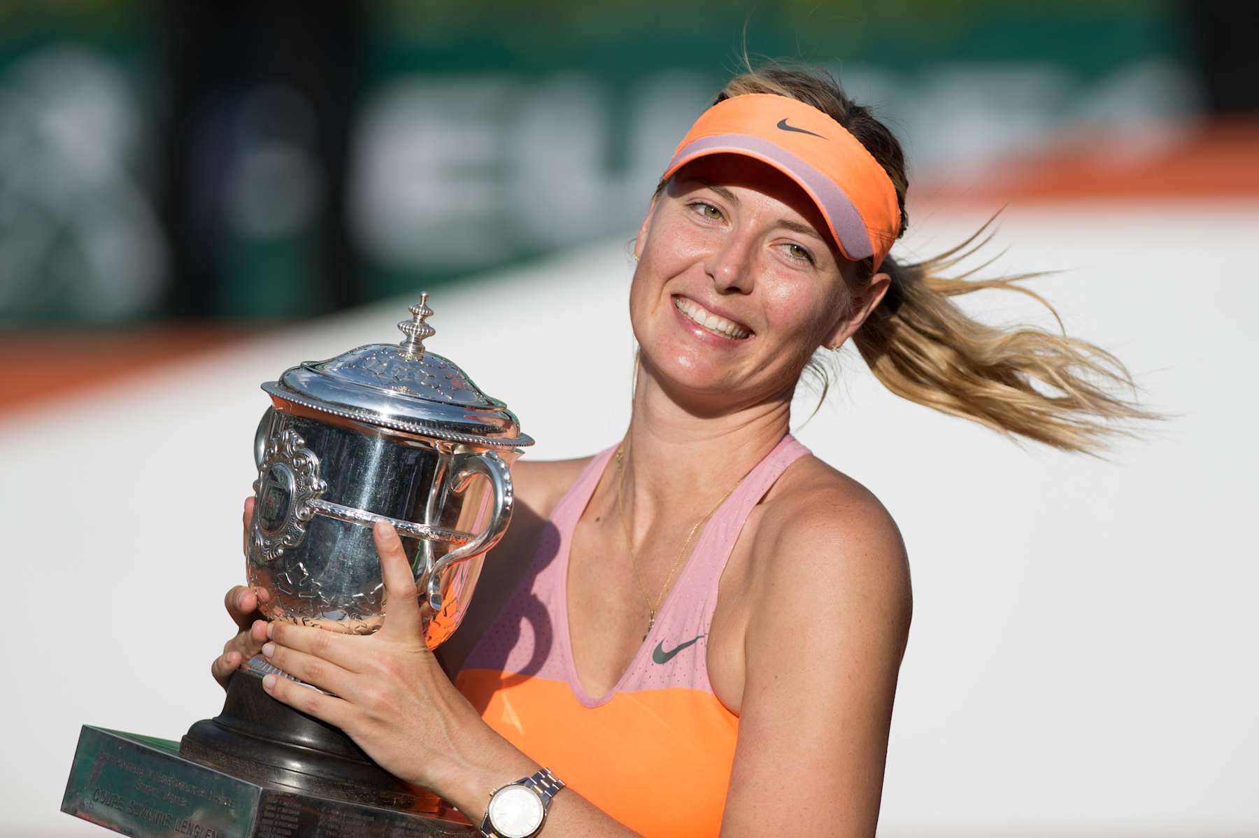 Maria Sharapova of Russia poses with the Coupe Suzanne Lenglen trophy following her victory in the women's singles final match against Simona Halep of Romania on day fourteen of the French Open at Roland Garros on June 7, 2014 in Paris. (Photo by Stephane Cardinale/Corbis via Getty Images)